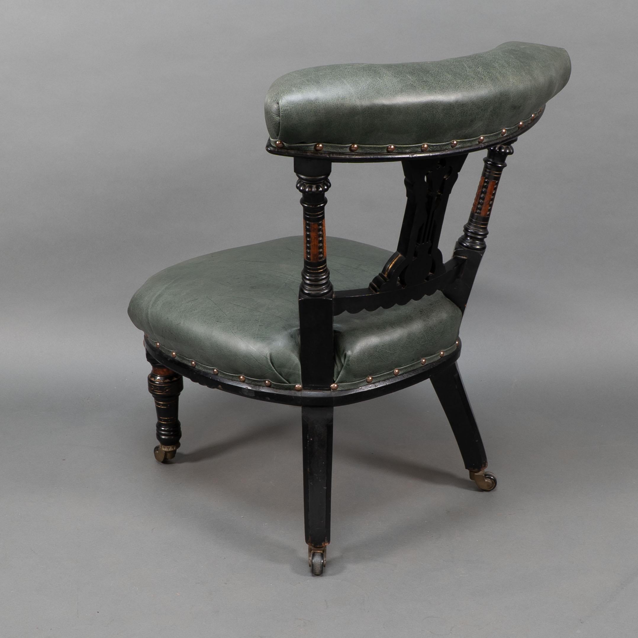 Ogdens Of Manchester. An Aesthetic Movement Ebonized & Parcel Gilt Nursing Chair For Sale 10