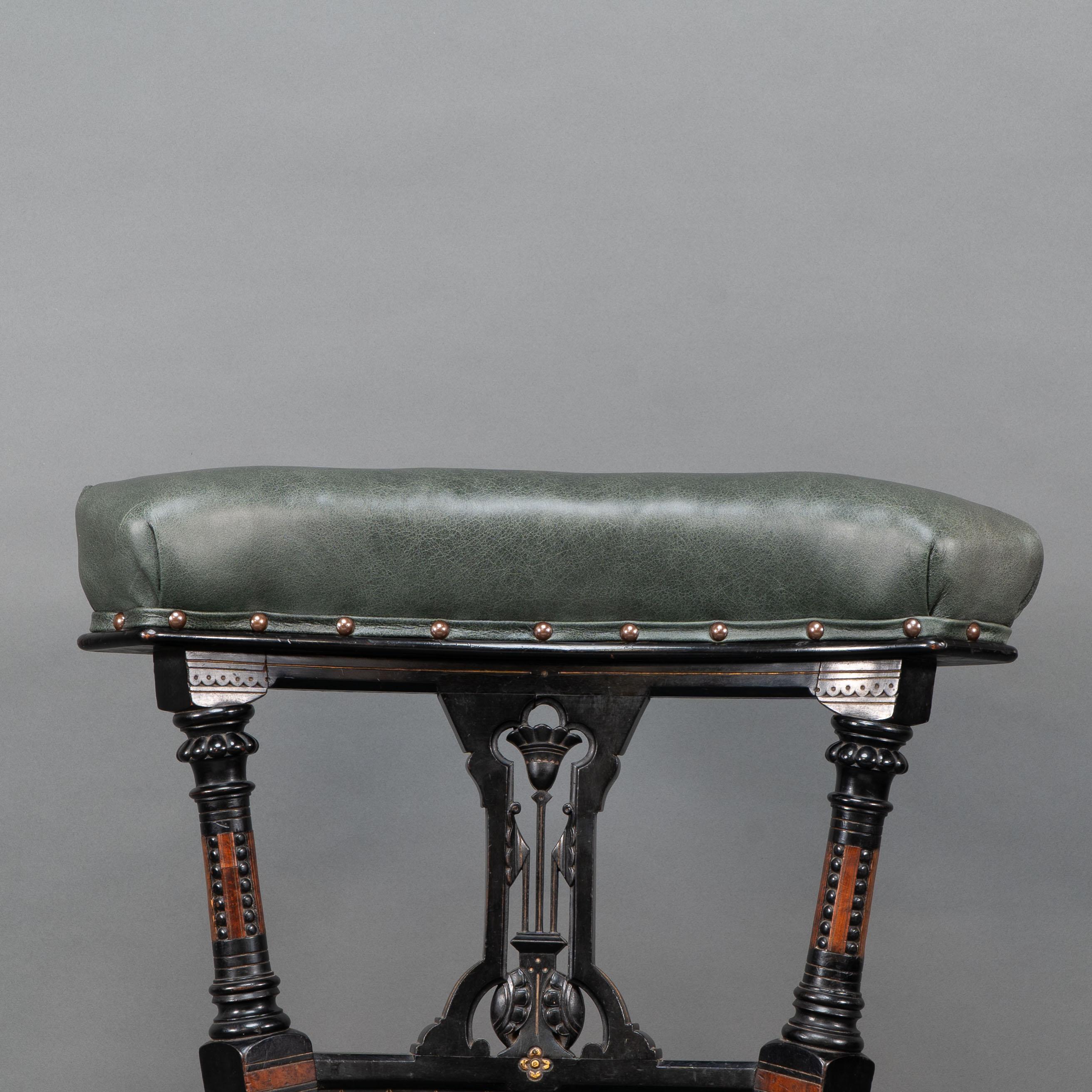 19th Century Ogdens Of Manchester. An Aesthetic Movement Ebonized & Parcel Gilt Nursing Chair For Sale