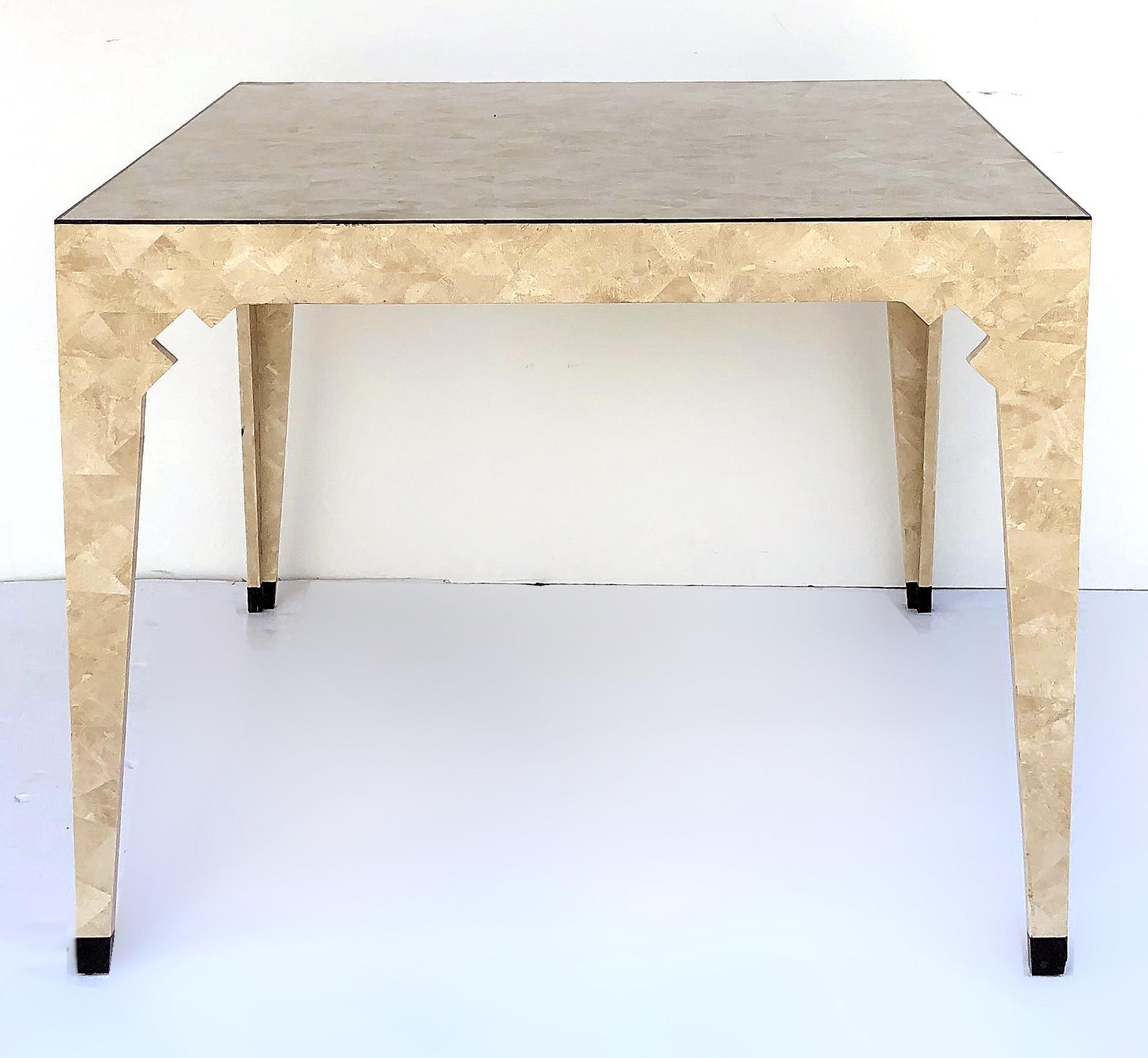 Oggetti Italian modern tessellated stone game table.

Offered for sale is a 1980s Italian modern tessellated stone game table modern from the Tavola Collection for Oggetti. The square game table is a circa 1970s-1980s tessellated stone tile clad
