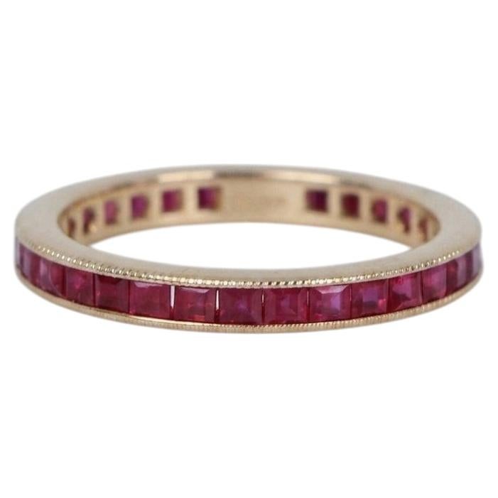 Princess Cut Ruby Eternity Band in 18k Yellow Gold