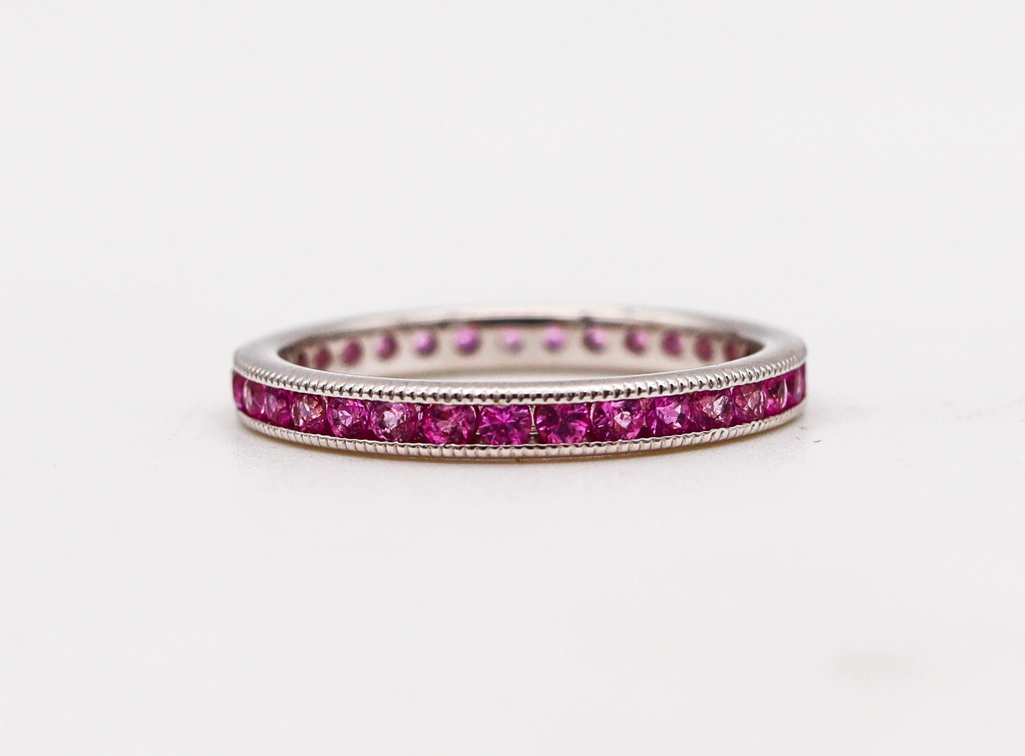 Brilliant Cut Ogi Eternity Band Ring in 18kt White Gold with 1.40ctw in Vivid Pink Sapphires For Sale