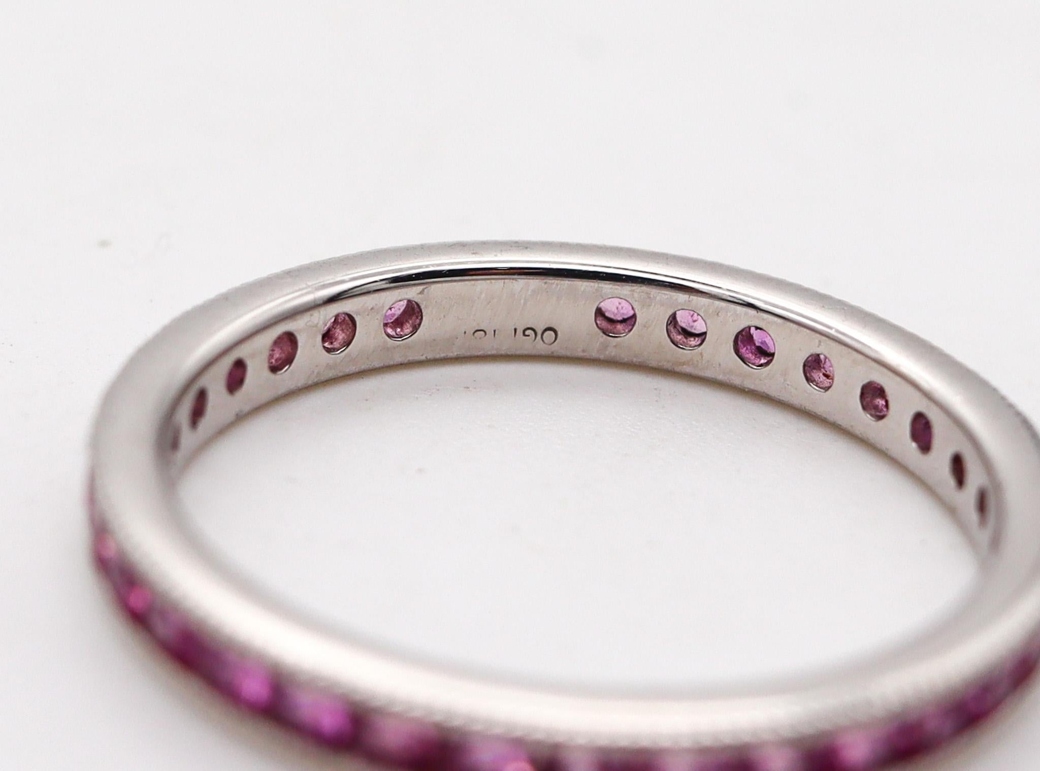 Ogi Eternity Band Ring in 18kt White Gold with 1.40ctw in Vivid Pink Sapphires In Excellent Condition In Miami, FL