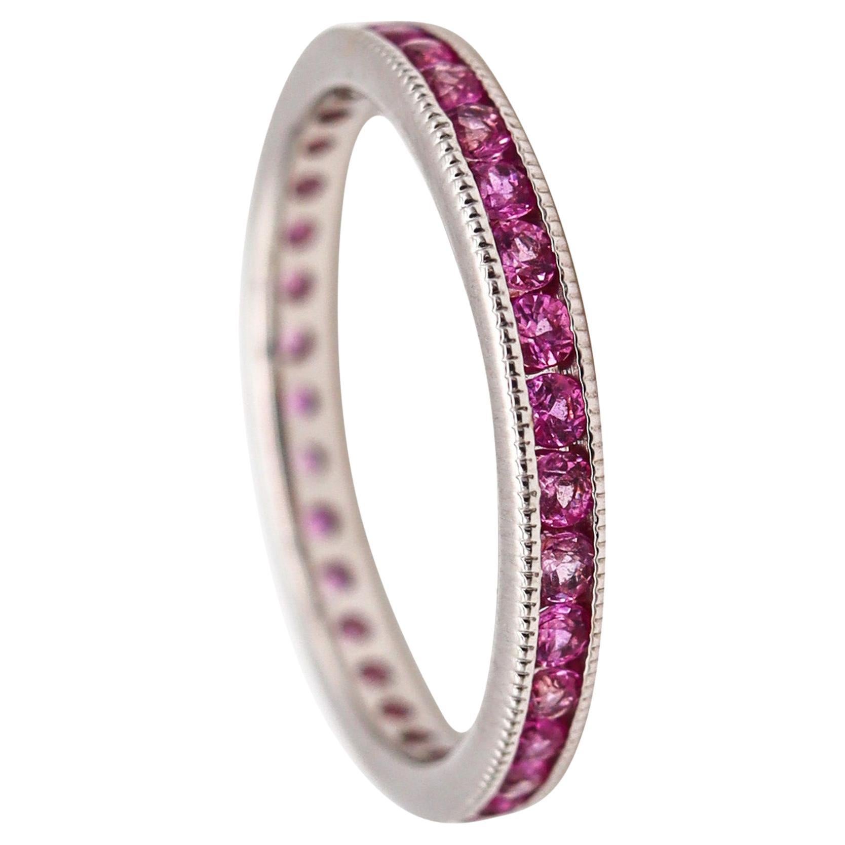 Ogi Eternity Band Ring in 18kt White Gold with 1.40ctw in Vivid Pink Sapphires For Sale
