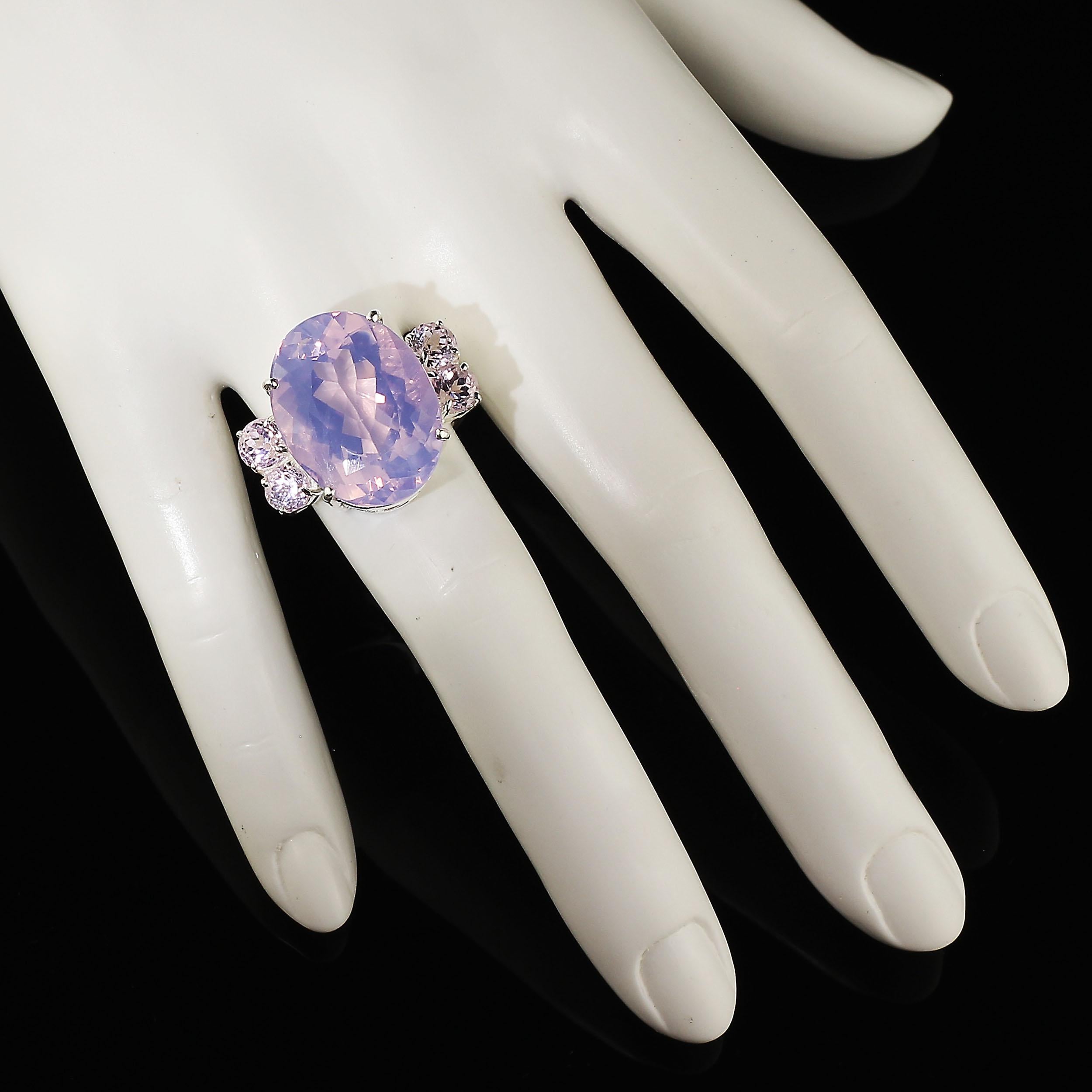 Yummy﻿ Lavender Quartz oval Cocktail Ring with four Rose of France accent gemstones.  If you love being noticed this is your ring!  23.15 carats of pizzazz. This Gemjunky size 7.5 ring is hand made Sterling Silver with a lovely basket in which the
