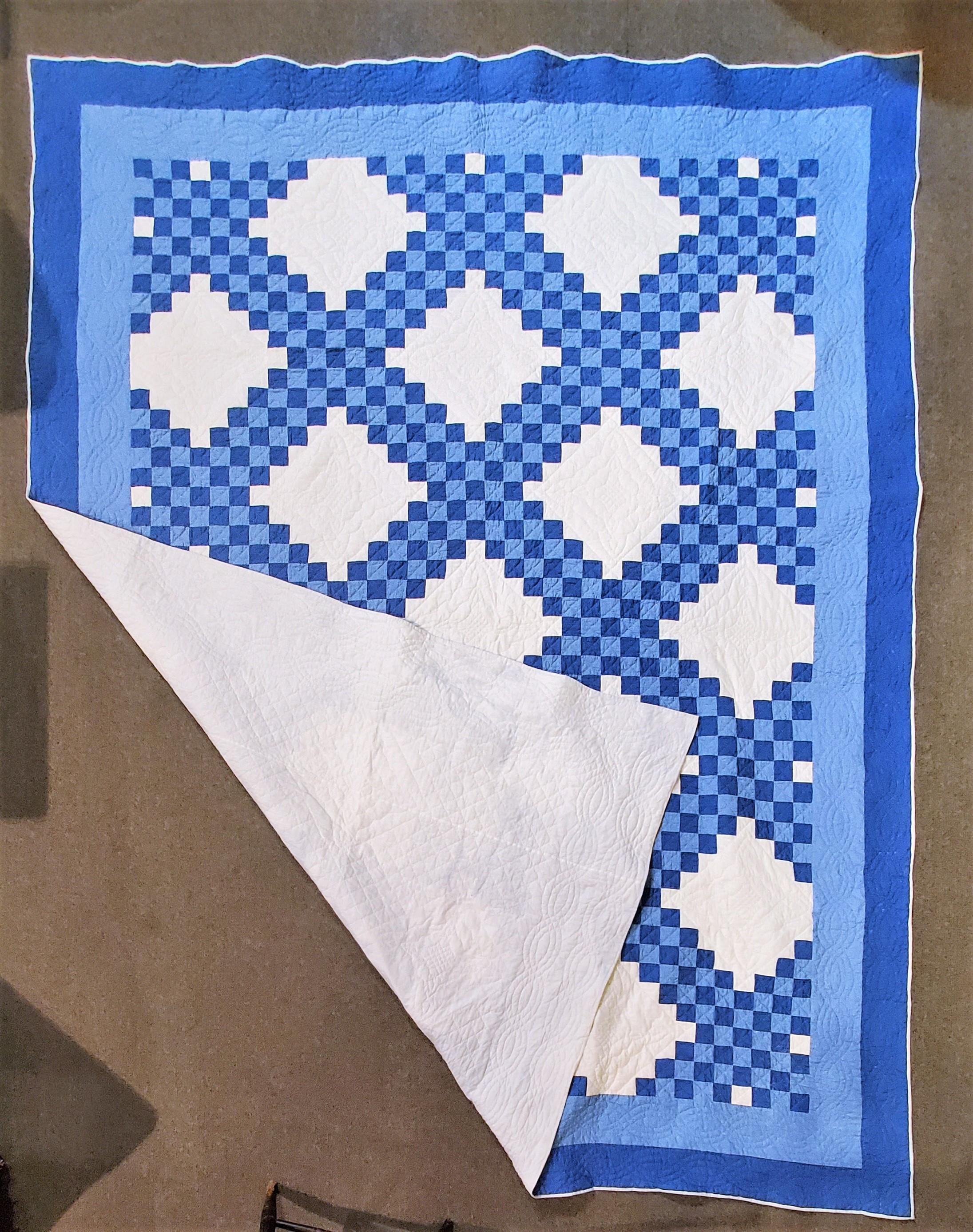 Antique Ohio Amish quilt in a triple Irish chain pattern in fine condition. The quilt is in fine condition and very nice quilting.