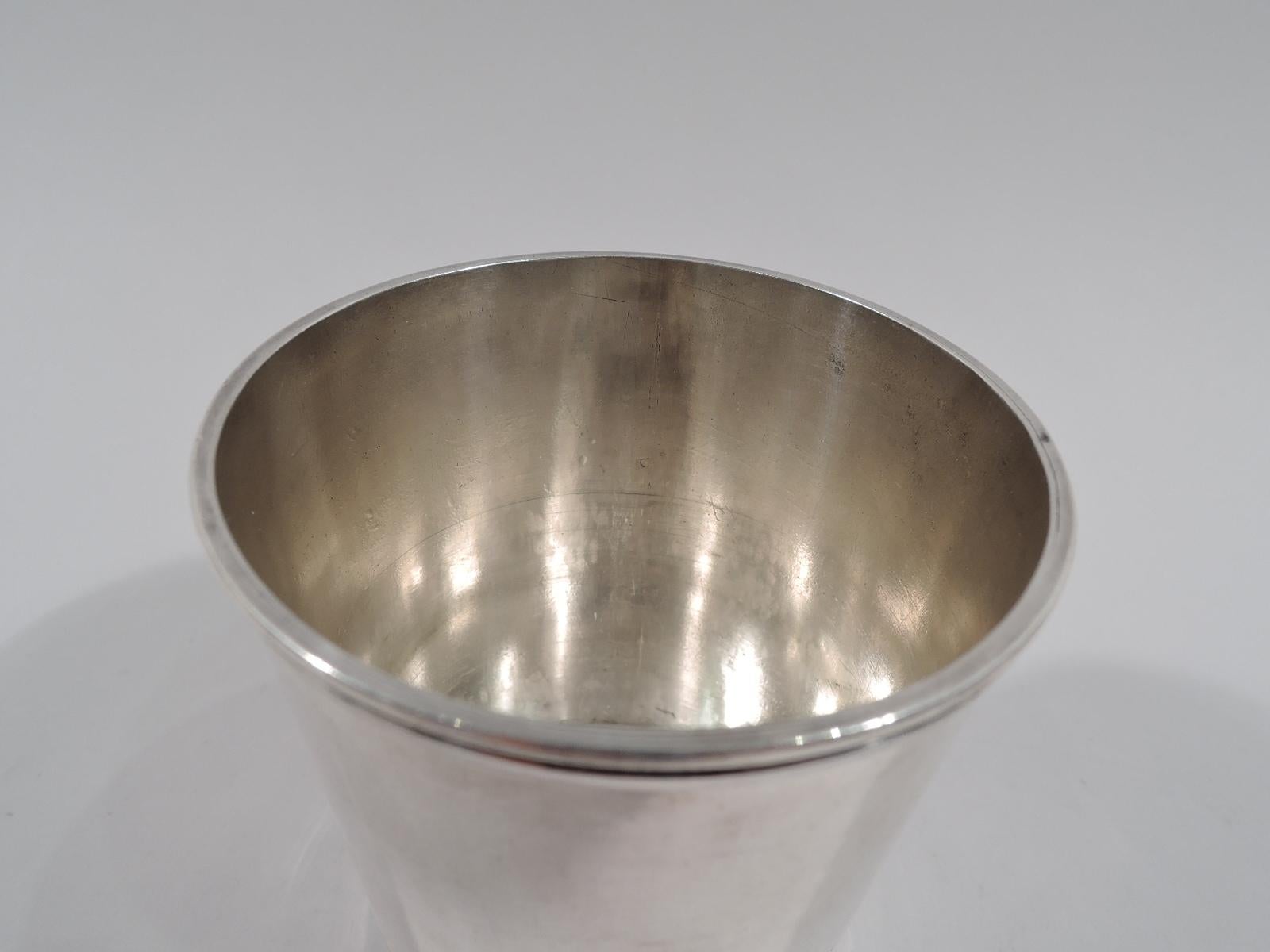 American coin silver mint julep. Made by The Duhme Company in Cincinnati, Ohio, ca 1850. Straight and tapering sides, and molded rim and base. A nice solo cup by an important regional maker. Marked “Duhme & Co.” Weight: 4 troy ounces.