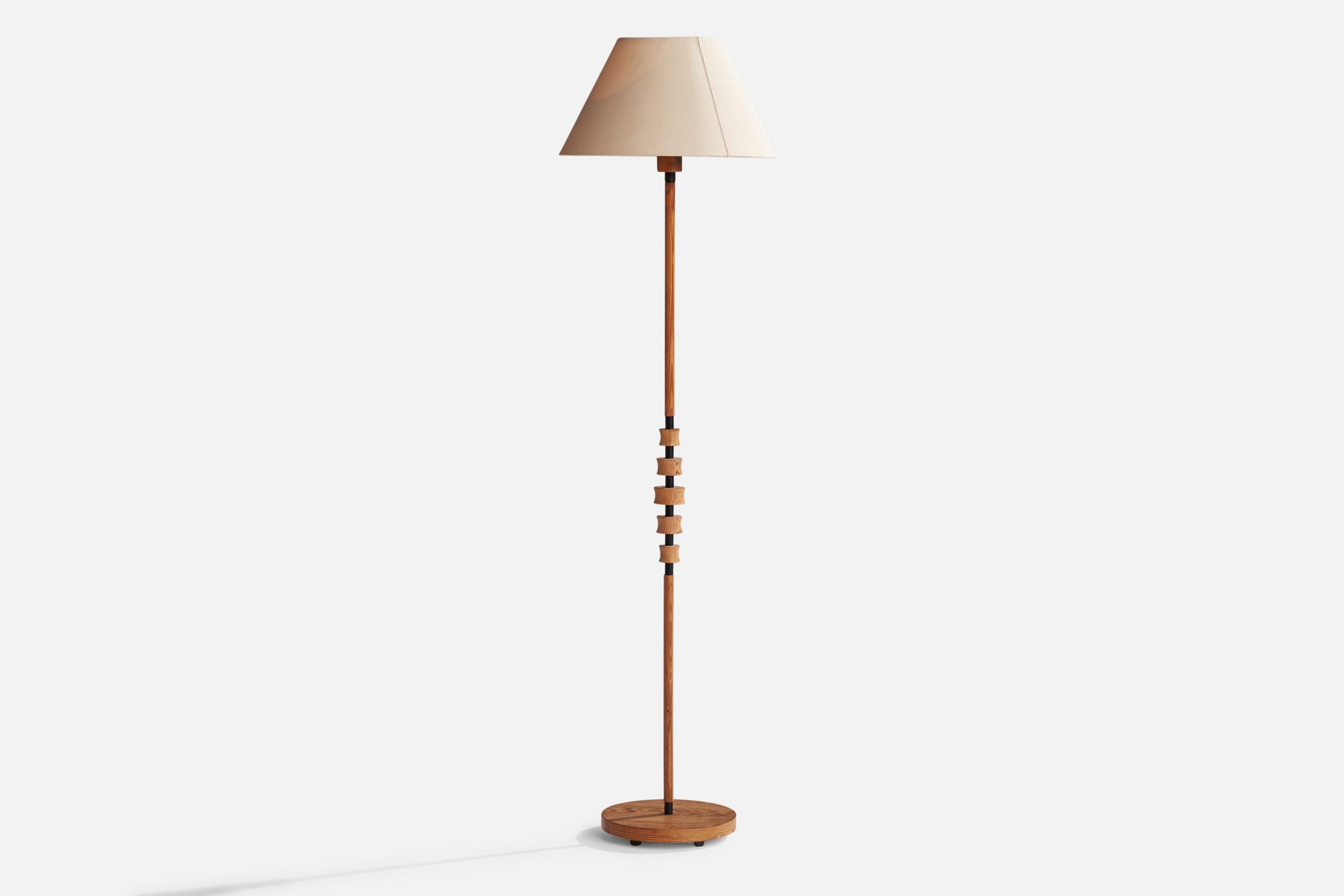 A pine, black-lacquered metal and off-white paper floor lamp designed and produced in Sweden, 1950s.

Overall Dimensions (inches): 58.5”  H x 15.75” W x 15.5” D
Stated dimensions include shade.
Bulb Specifications: E-26 Bulb
Number of Sockets: 1
All