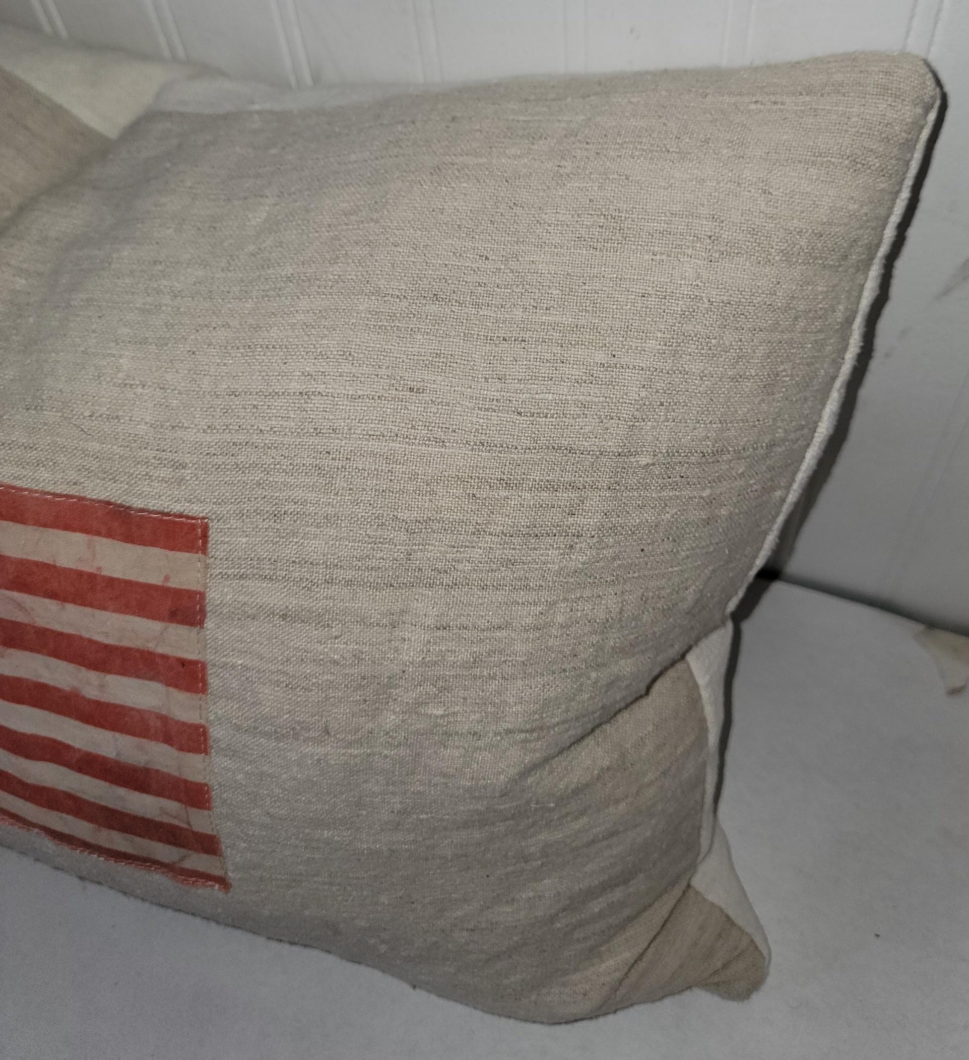 Stile Adirondack Oil Cloth Flag over Linen Pillow in vendita