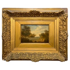 Oil Landscape on wood panel with carved composition frame, 19th Century