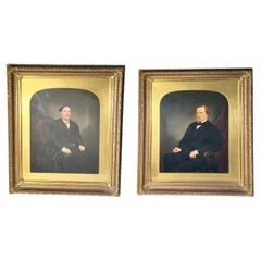 Portraits à l'huile sur carton d'un mari et d'une femme fortunés