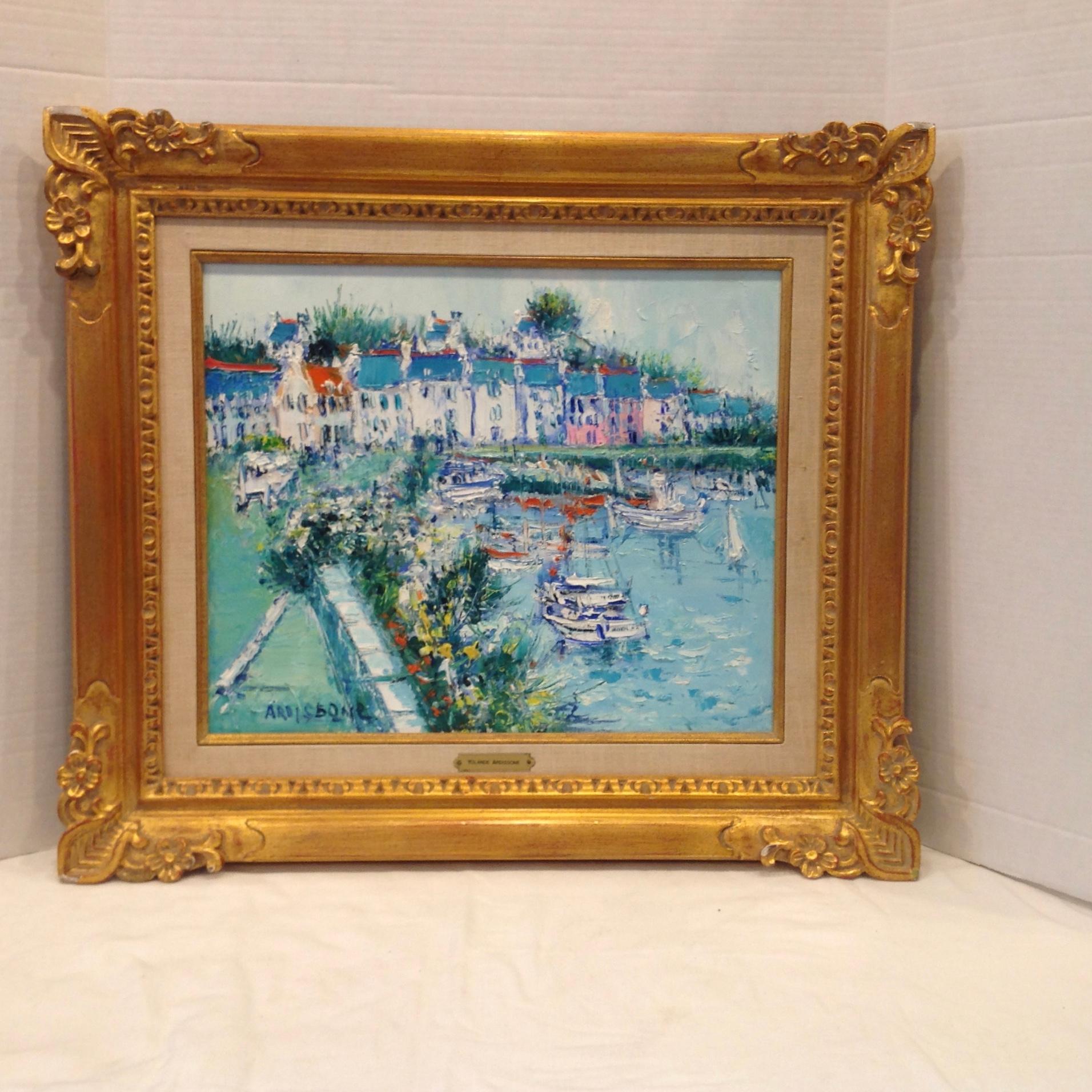 The painting bears the original Wally Findlay label on the reverse.
 It is a superb harbor scene by the iconic artist. Over all size with
frame is 26