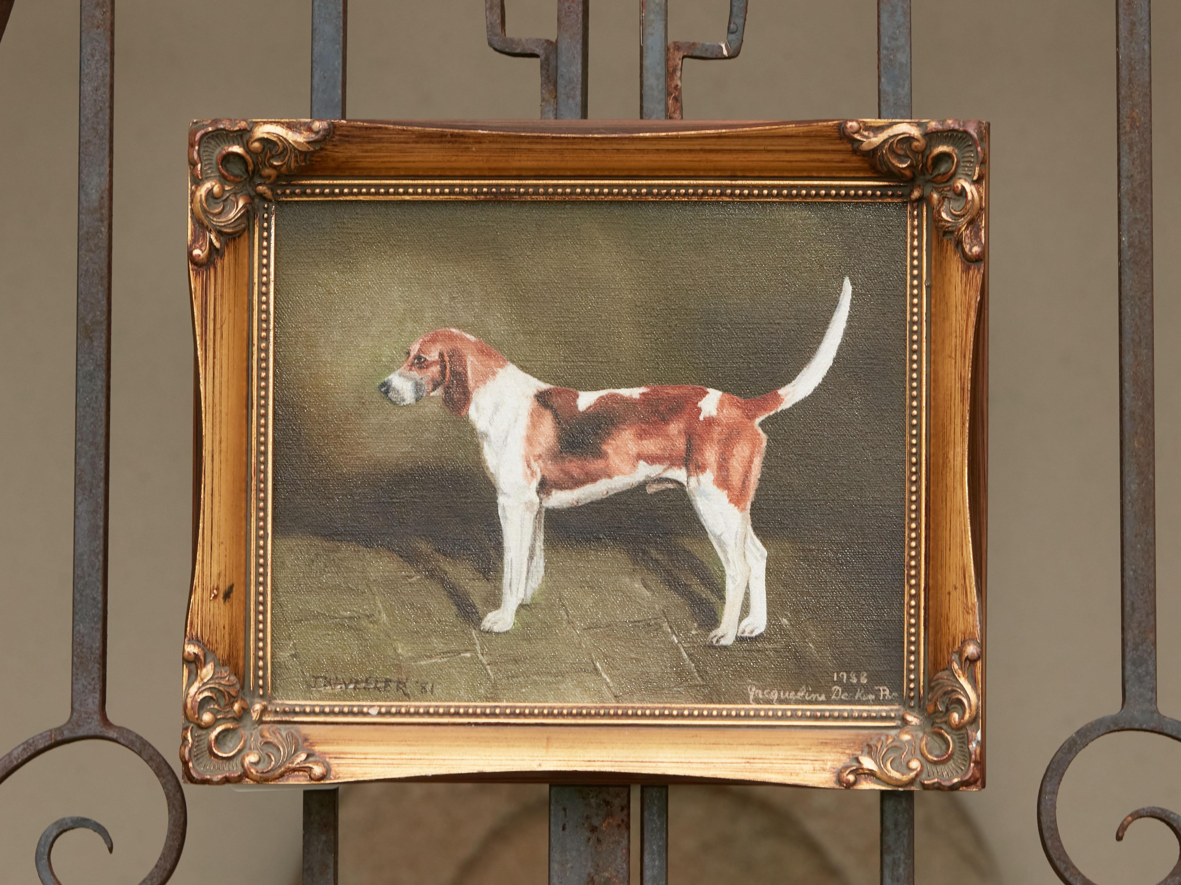 An American oil on canvas dog painting from the late 20th century depicting a Belvoir hound, signed Jacqueline Decker. Created during the last quarter of the 20th century, this rectangular oil on canvas painting boasts an undeniable air of