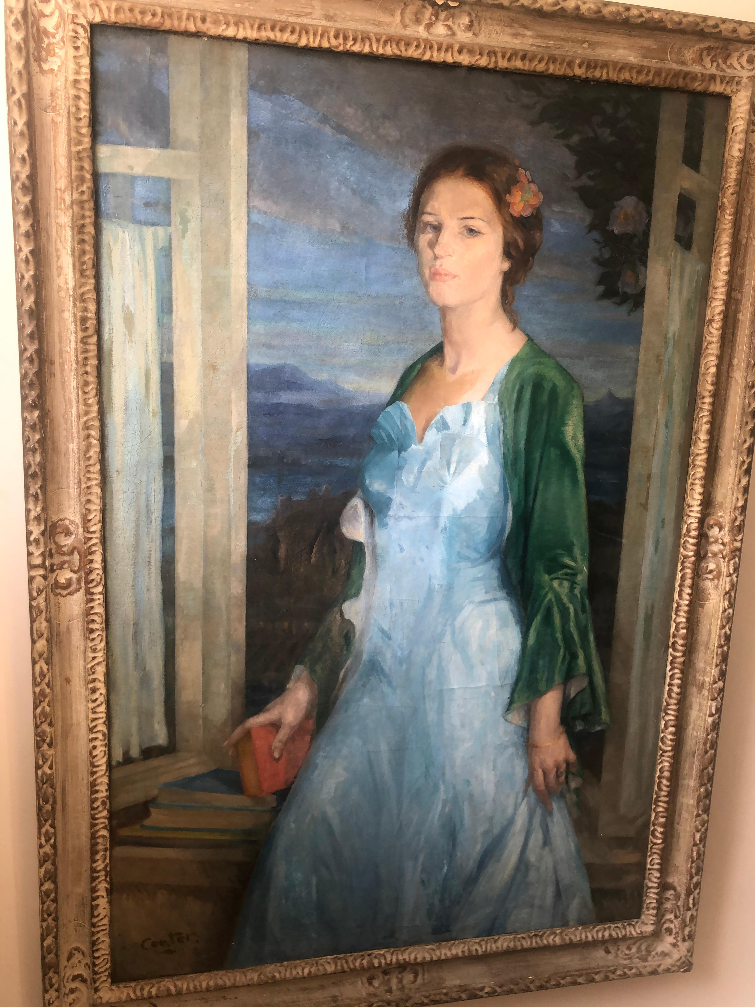 Portrait of a lady in sapphire blue silk gown at a window by E. Kenneth Center b.1903 oil on canvas laid (later) on board and signed lower left “Center” within a substantial grey painted and parcel gilt moulded frame
The reverse of the frame bears