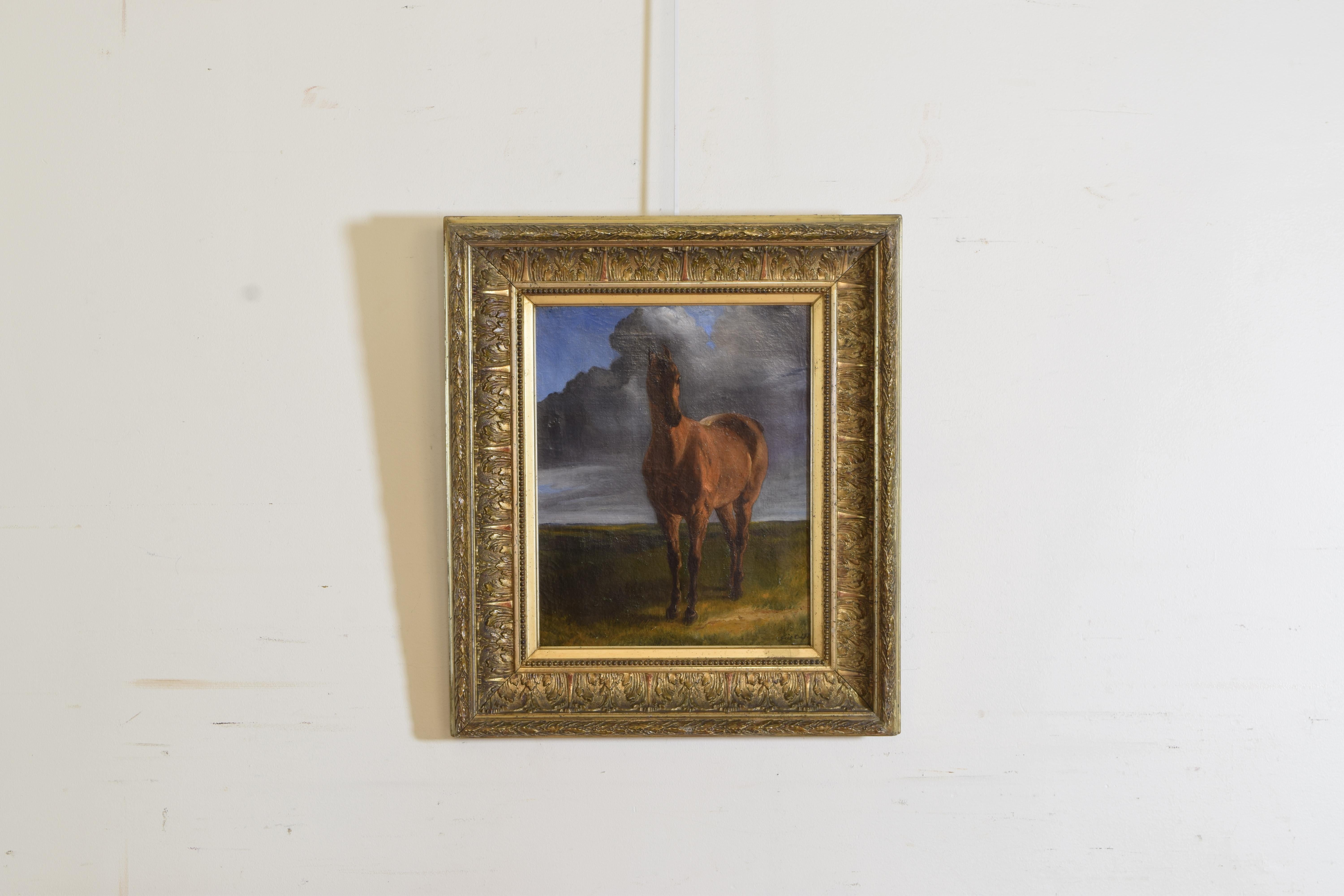 The proud horse holding its gaze with a storm approaching from behind in the early evening, in a period giltwood and gilt-gesso frame in perfectly restored condition.