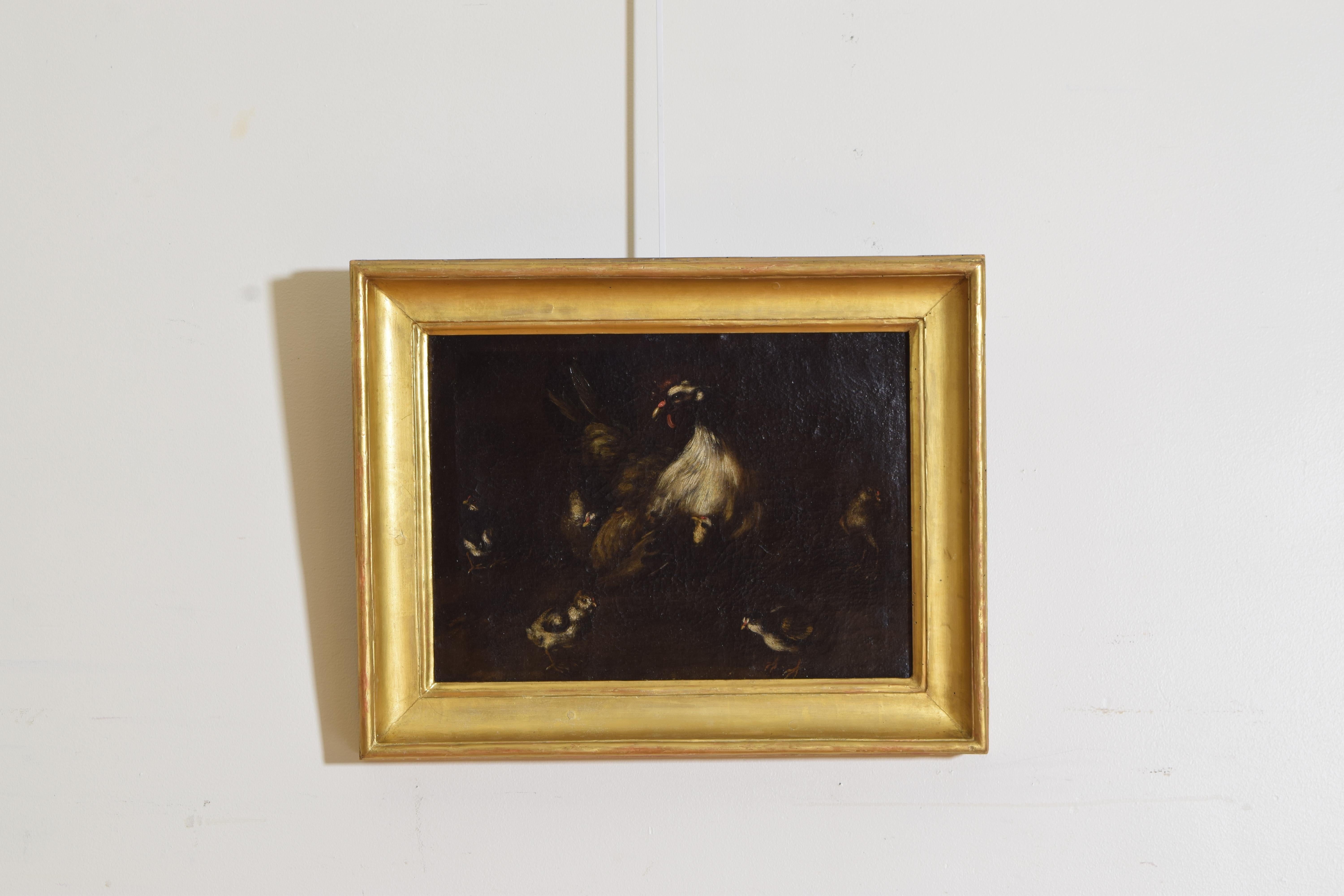 From the Emilia Romagna school of painting this is a depiction of a mother hen protecting her chicks, the period giltwood frame in perfect condition and retaining a paper label at top with a nearly illegible inventory number.