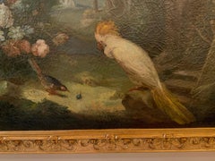 Olio su tela raffigurante un cacatua bianco con fiori in cornice dorata, XIX secolo