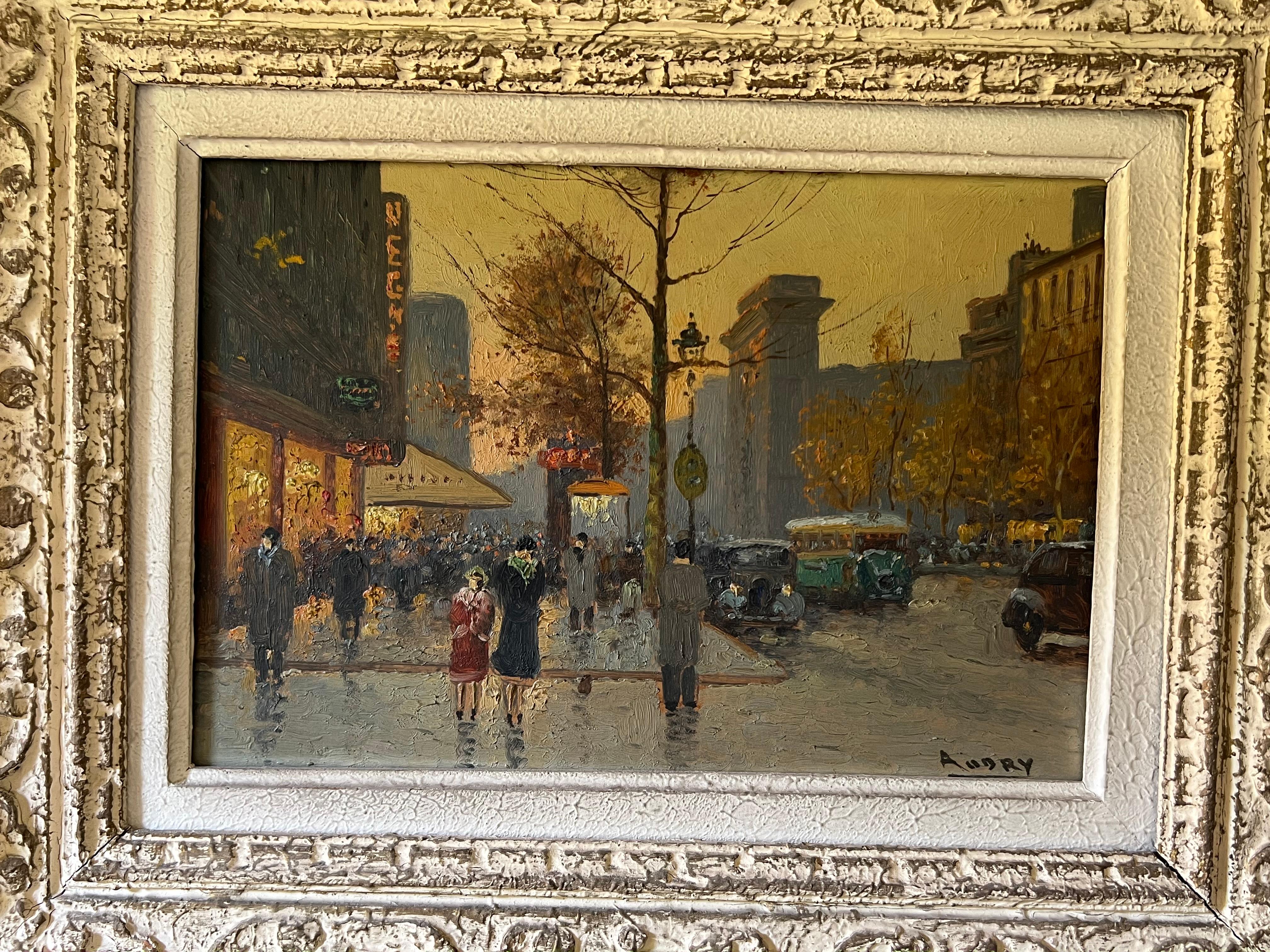 Cette très belle huile sur toile représente une vue de Paris dans un cadre Montparnasse. Il s'agit d'une œuvre française signée Audry. Vers 1930