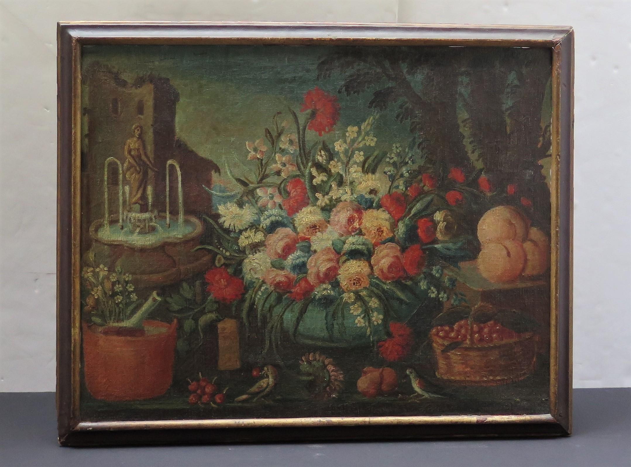 Huile sur toile représentant une composition florale avec des faintains, des oiseaux, des poires, des cerises et des pêches. 
Coloniaux espagnols du 18e siècle