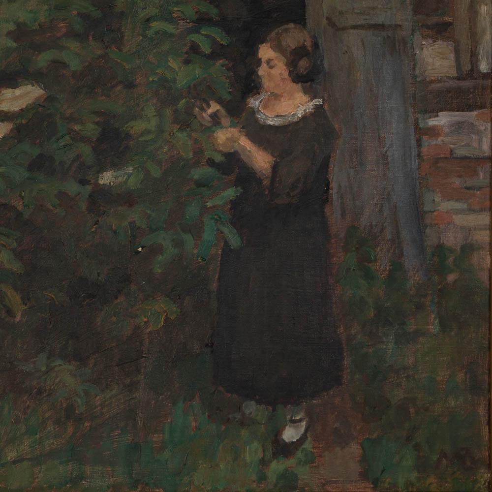 This original oil on canvas of a woman pruning a small flowering tree in front of an old country brick outbuilding is by the Danish artist Majsa Bredsdorff (1887-1964). The painting is mounted in a gold painted frame and artist initials in the lower