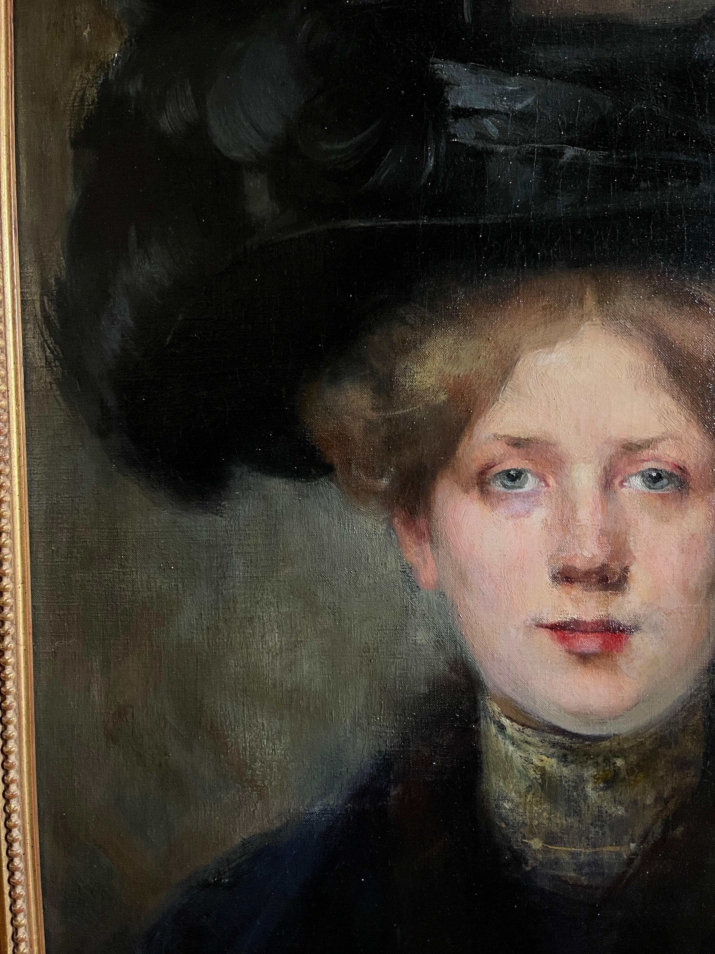 Oil on canvas, portrait of a lady with a hat
 late 19th France signed Julie Marest
This dazzling painting represents a very beautiful lady in a hat topped with a black feather plume.
Her green eyes, her fair skin, her red lips, her light brown hair