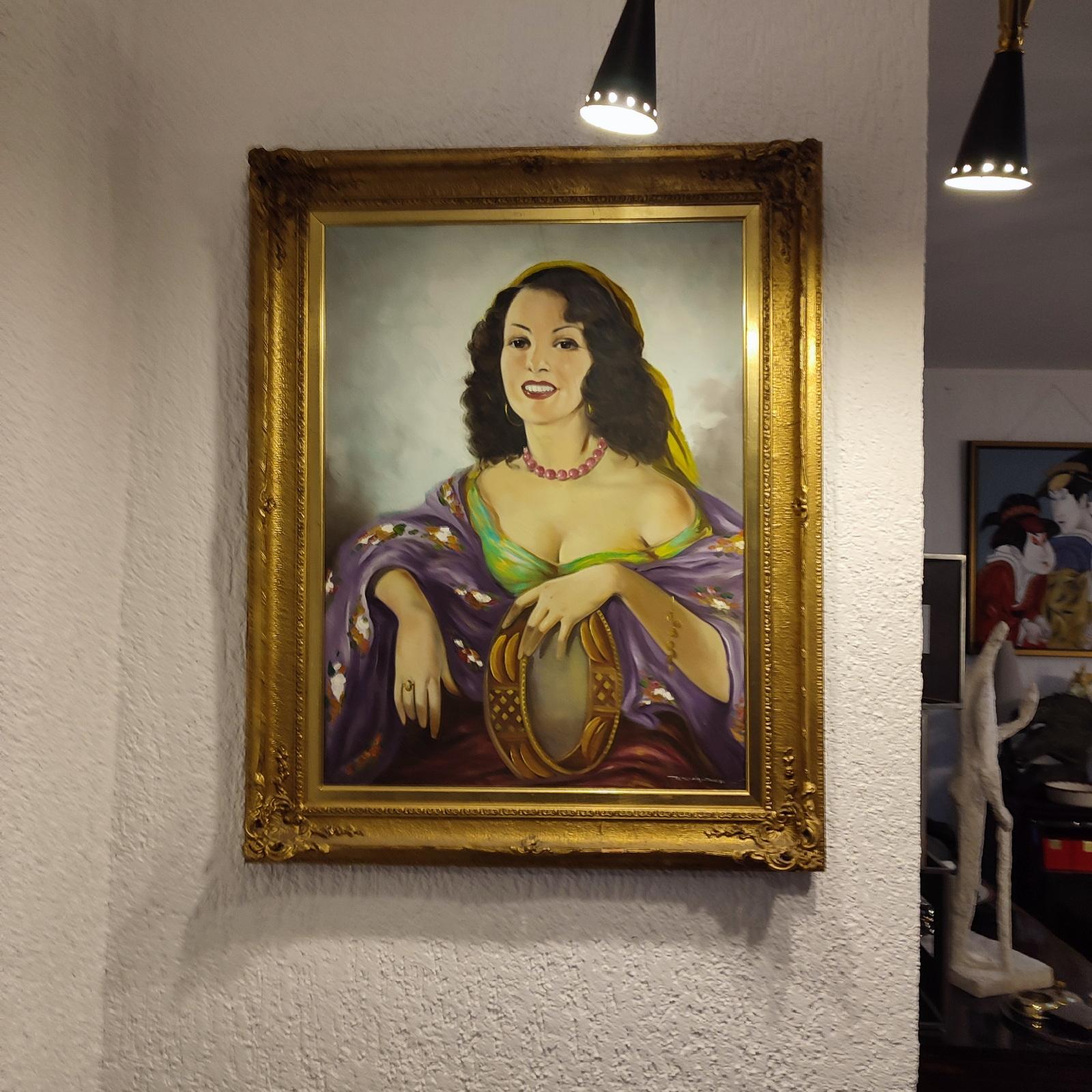 Temesvári Thiesz E. - Öl auf Leinwand - erste Hälfte des 20. Jahrhunderts,
Gemälde Größe 79 x 59 cm
Porträt eines böhmischen Mädchens, das Tamburin spielt, Ungarische Schule aus den 1940er Jahren.
Es wird mit dem Rahmen verkauft!
Dieses exquisite