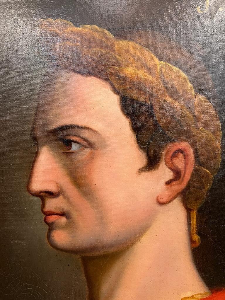 We present you with this stunning oil-on-canvas portrait painting depicting former Roman general and statesman Julius Caesar (100 BC - 44 BC) in a deep scarlet cloak which was traditionally worn by commanders on campaigns. It dates back to the early