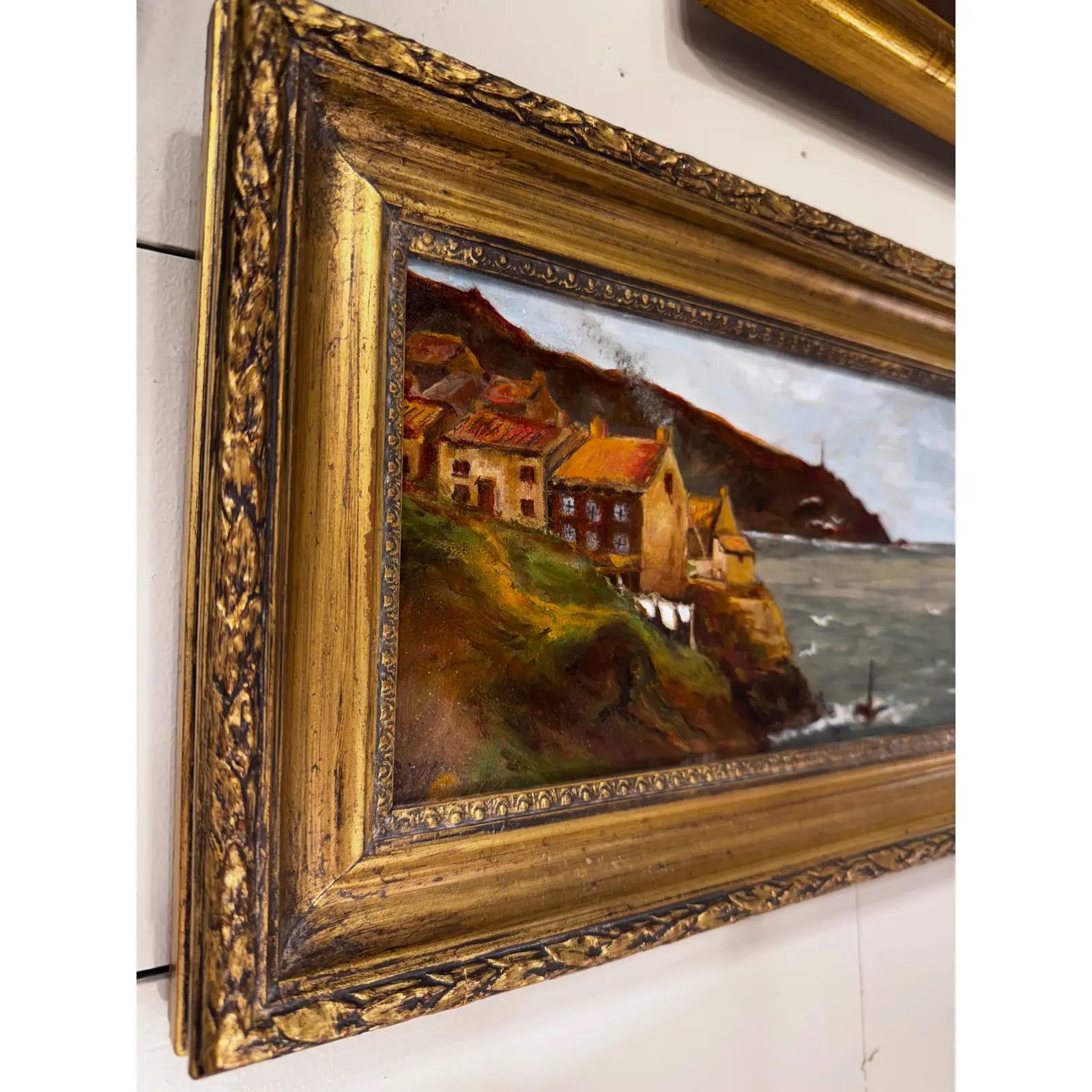 This beautiful oil on canvas brings the sea to any living area! Hailing from England, this painting depicts a village on the seaside cliffs, complete with homes residences, a small outbuilding, and a clothesline. On the opposite side of the bay, a