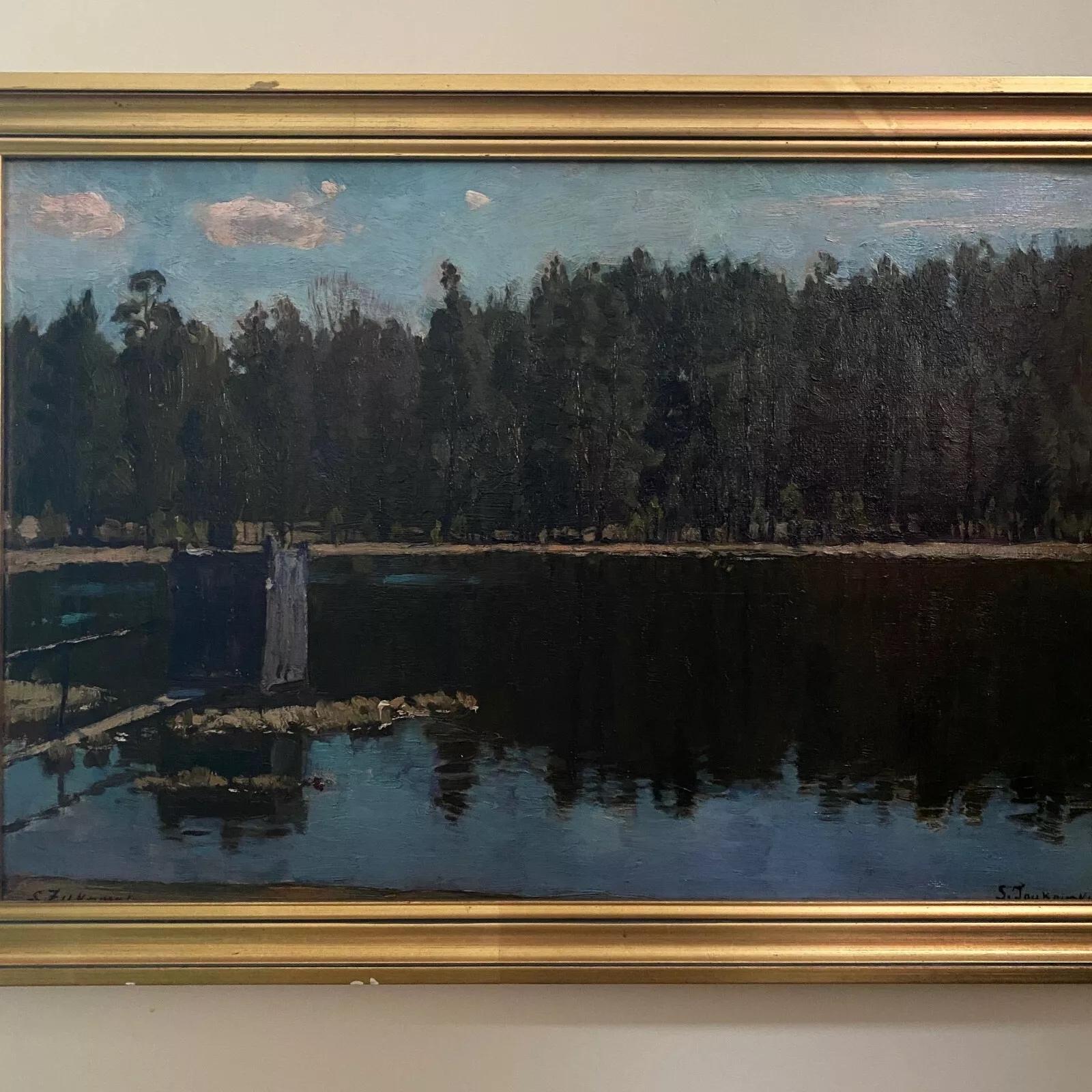 Oil on cardboard by Stanislaw Zukowski body of water at dusk 

This oil on cardboard was created by Stanislaw Zukowski, it represents a pond or a lake in the dark, perhaps at dusk. The body of water is bordered by a forest.

Stanislaw Joukowski