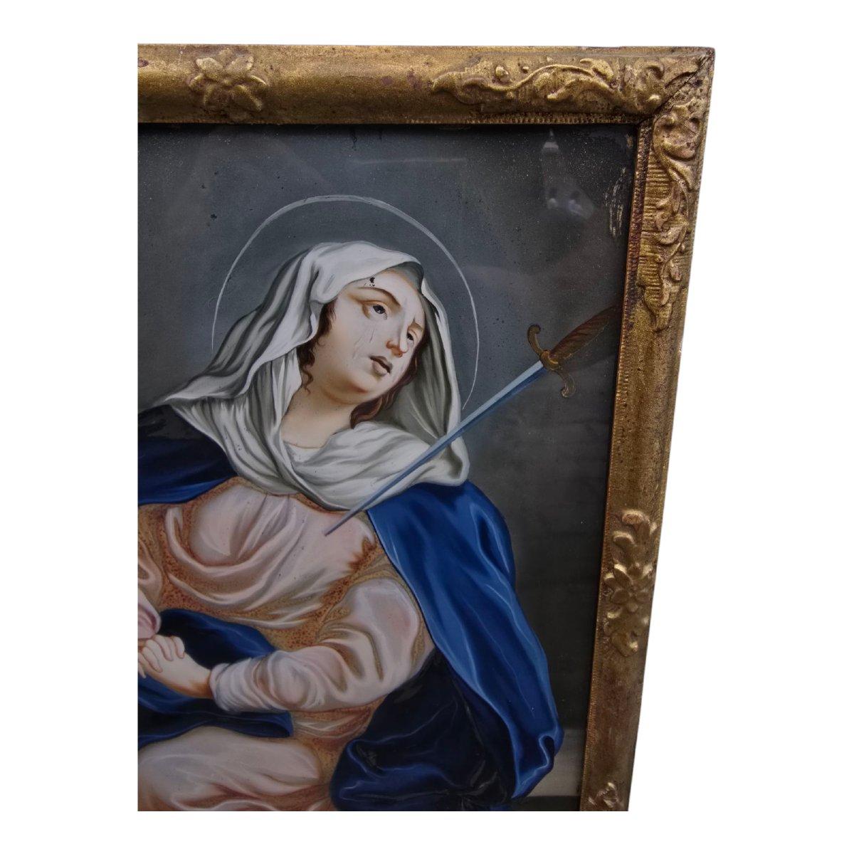 Peint à la main Huile sur verre représentant Notre-Dame des Douleurs - XVIIIe siècle en vente