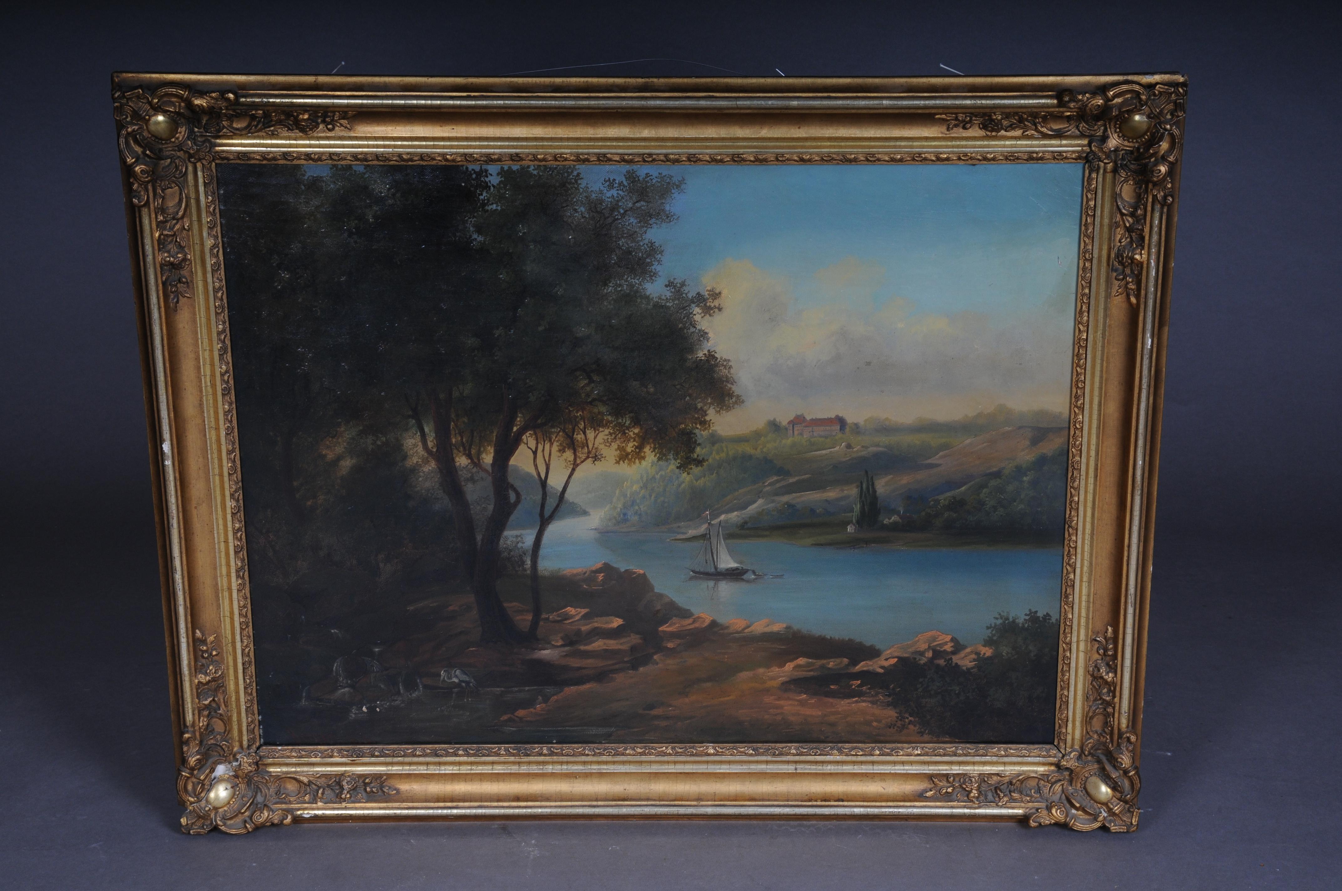 Oil painting idyllic river landscape/romantic scene 19th century

Finely painted oil on canvas depicting a river landscape with a sailing boat under a bright blue sky. A castle can be seen in the far distance. The painting has an incredible depth