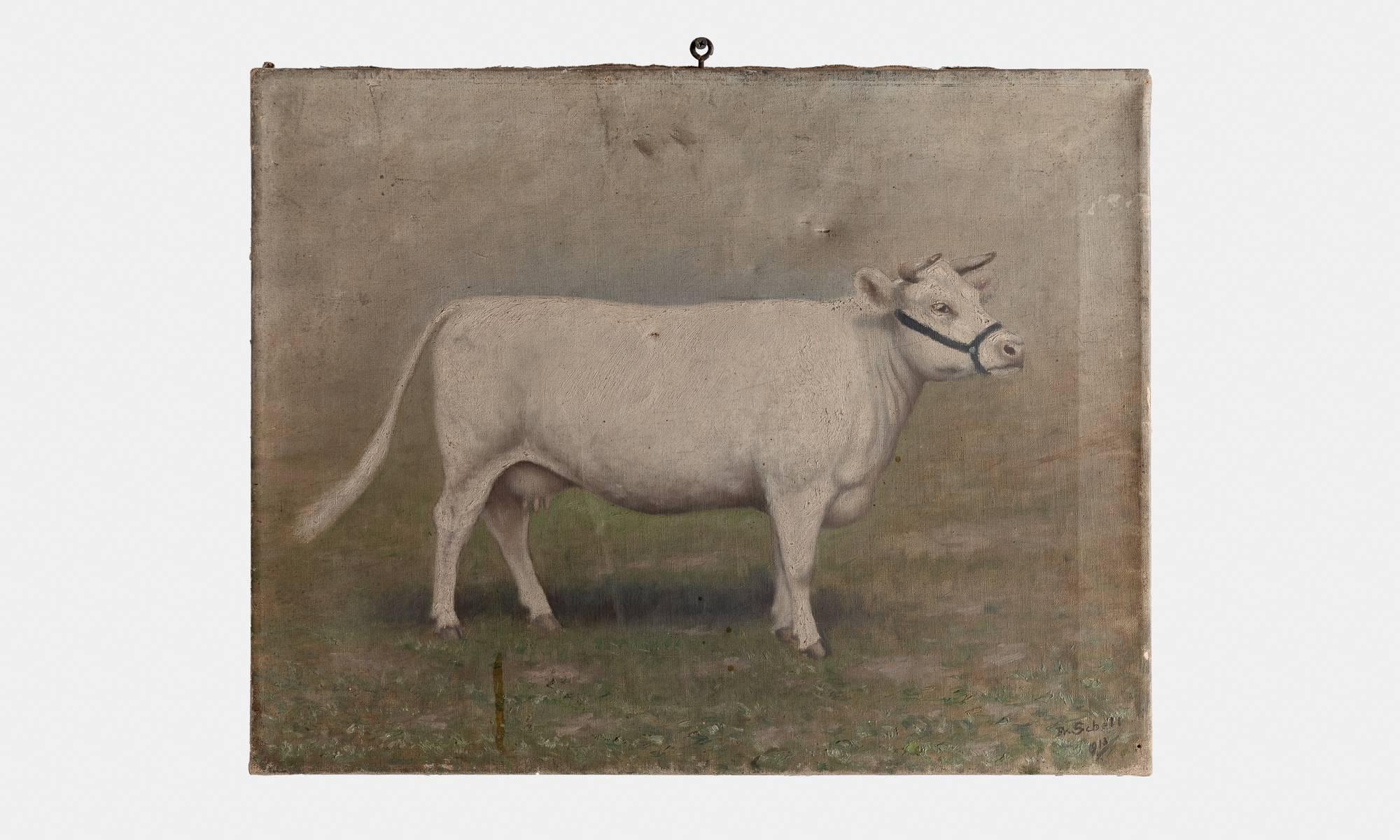 Oil Painting of a Cow, 1913

A handsome depiction of a cow in oil paint includes a wonderful patina and a top-mounted I-hook hanger. Signed and dated 'Fr. Schell, 1913'.