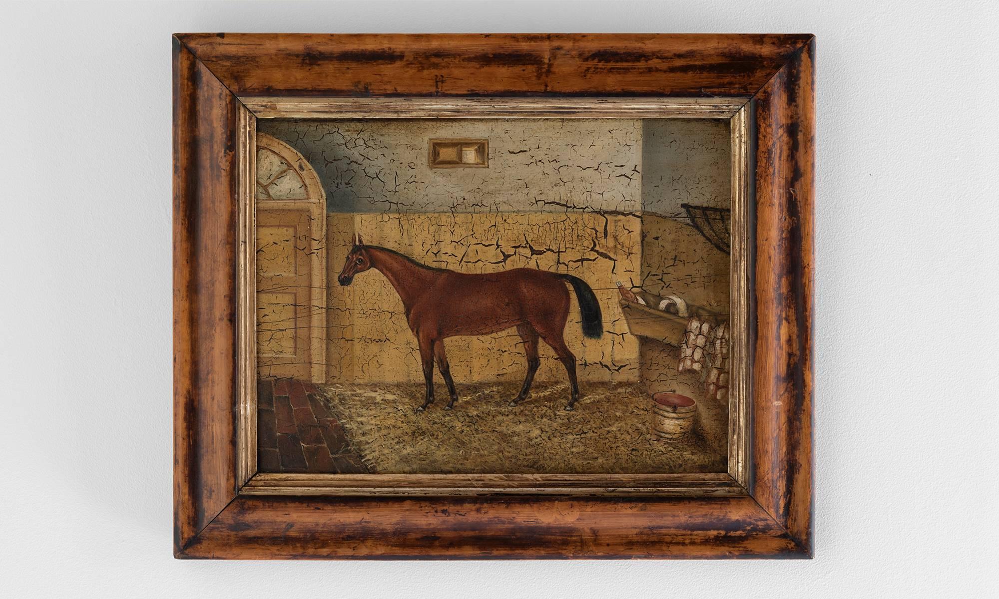 Oil painting of a racing horse, circa 1840.

Depiction of a horse in a stabile. Oil on board with walnut veneered frame.