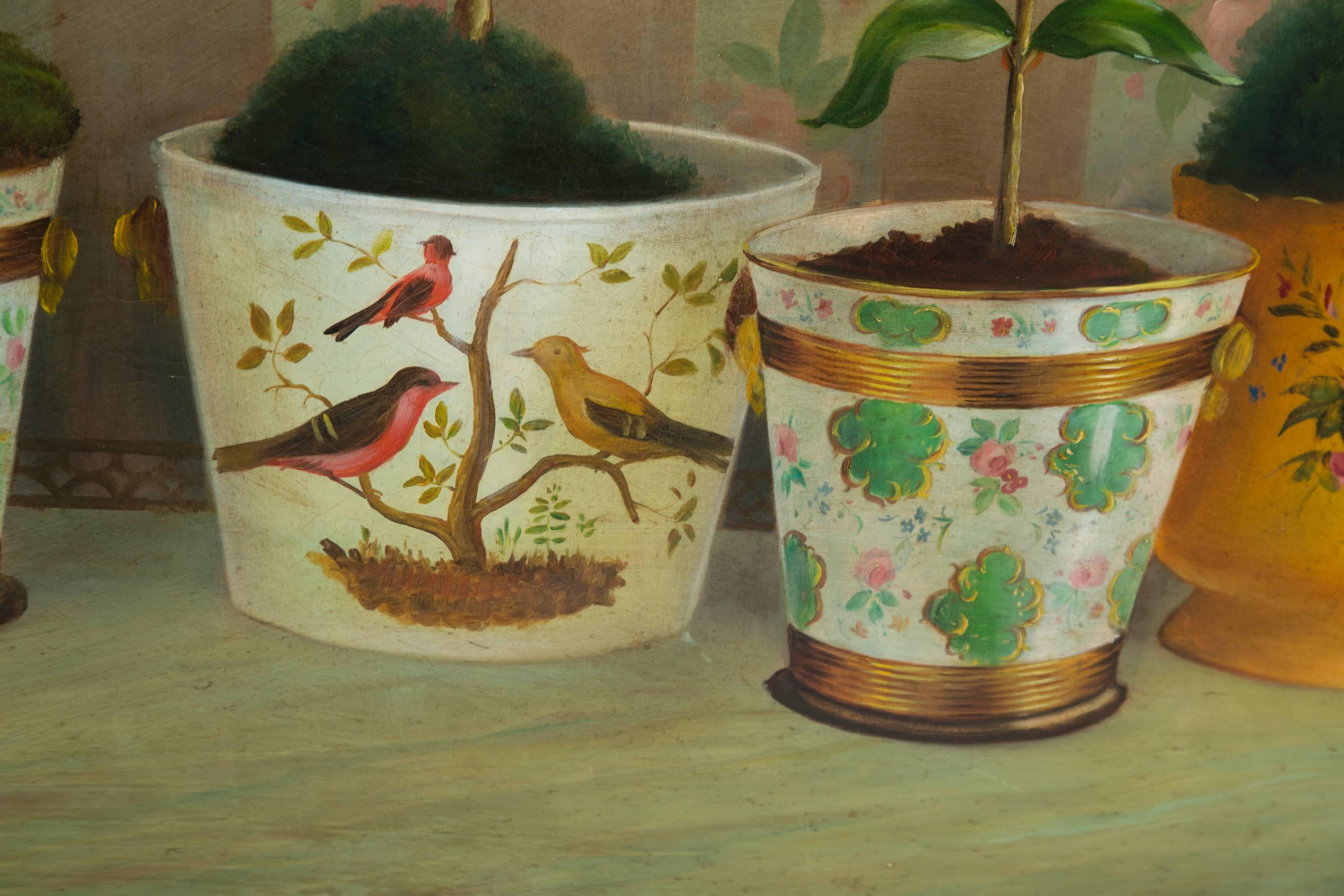 This soft and sophisticated still life depicts a series of potted floral plantings in decorated planters. Signature indistinctly in the lower left corner, early 20th century.