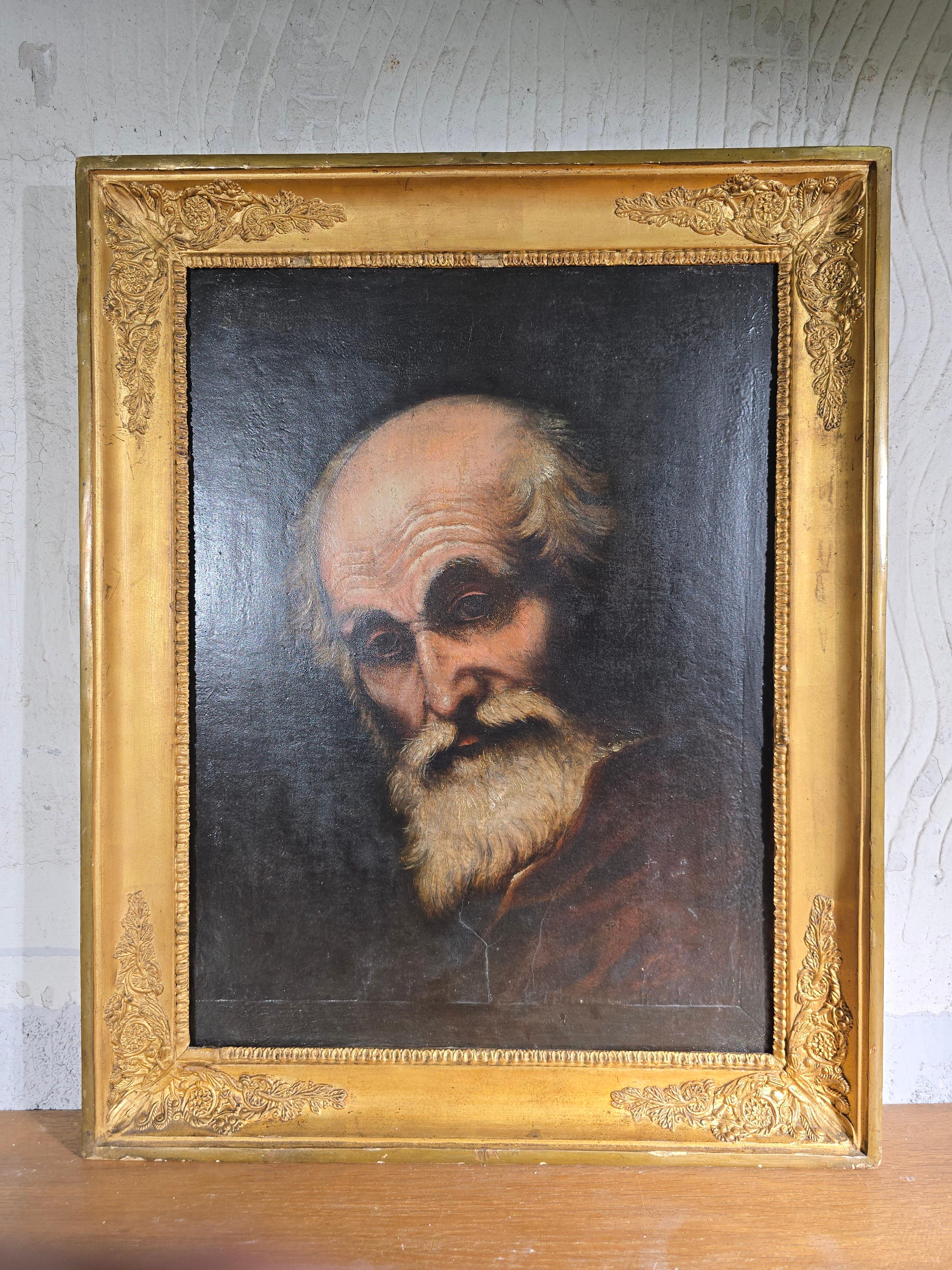 A 19th-century oil painting on canvas adhered to a wooden panel, depicting Saint Paul in a classic religious representation. The artwork is framed in its original period wooden frame, adding to its historical value and authenticity.

Dimensions: 52
