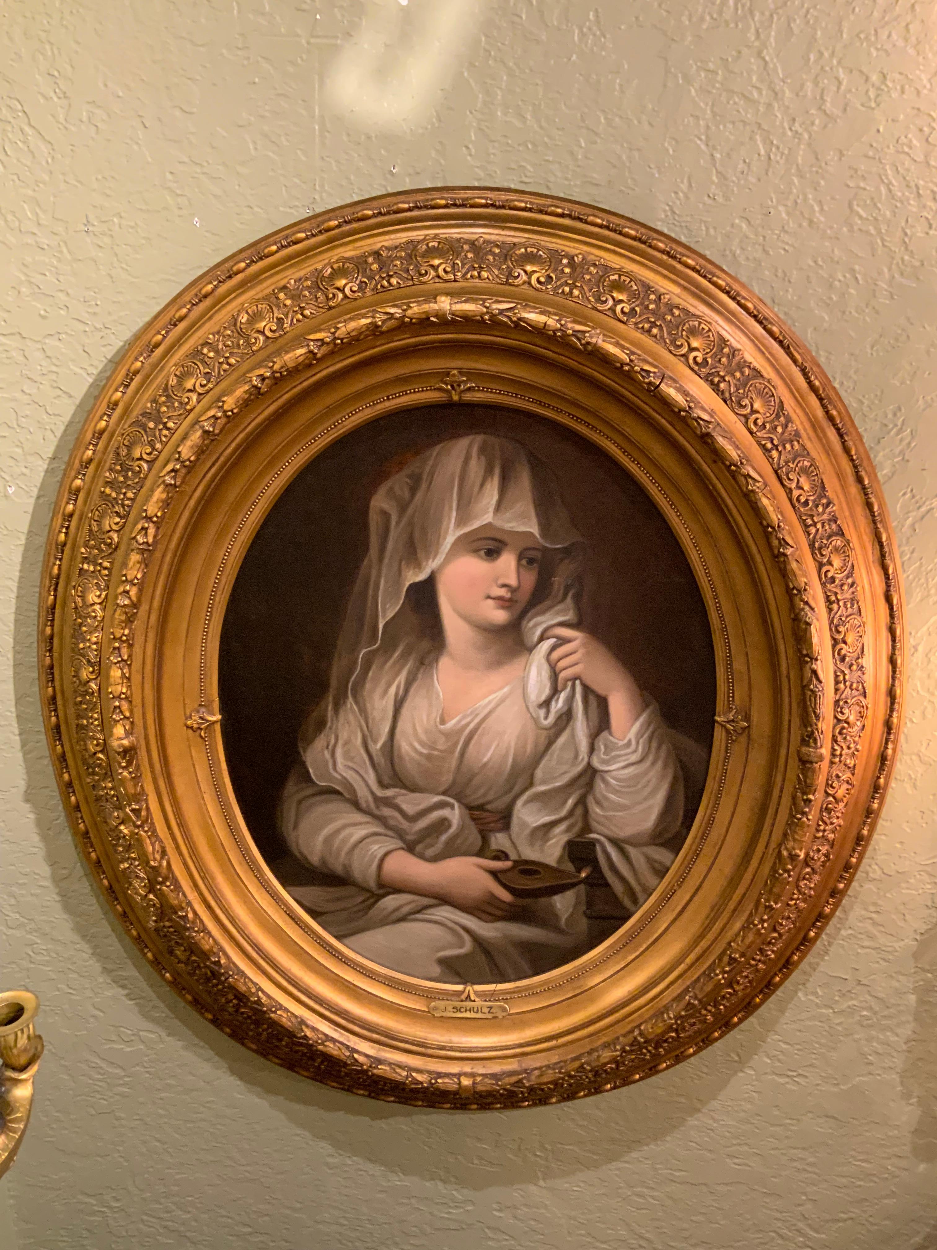 La peinture est un très beau travail dont le sujet est une belle 
La femme comme vestale. Le visage est exquis et la
Le drapage des costumes est bien fait. Le cadre est en très bon état. 
Avec un effet dimensionnel.