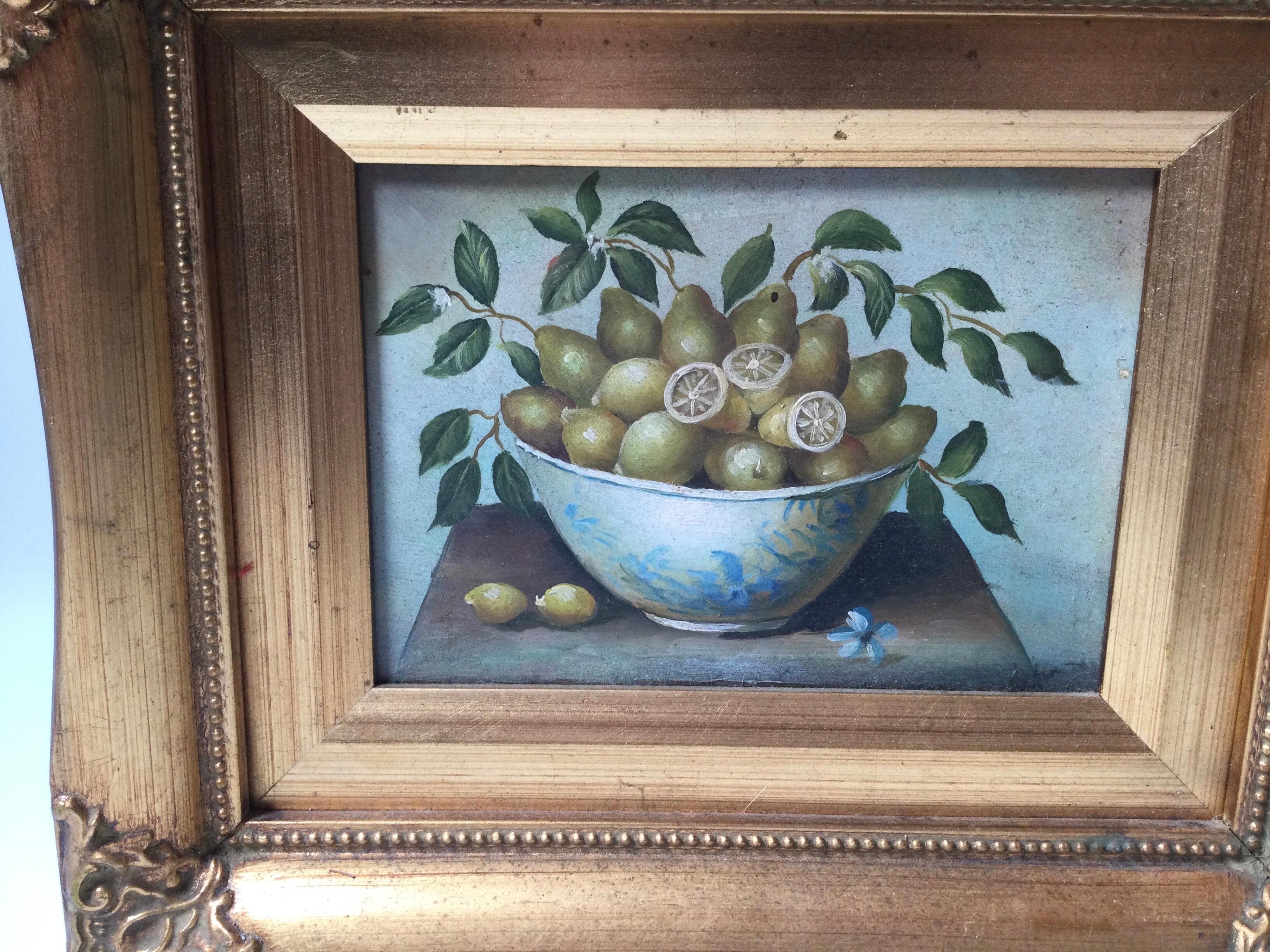A charming oil painting in gilt wood frame, still life of a bowl of pears and lemons.