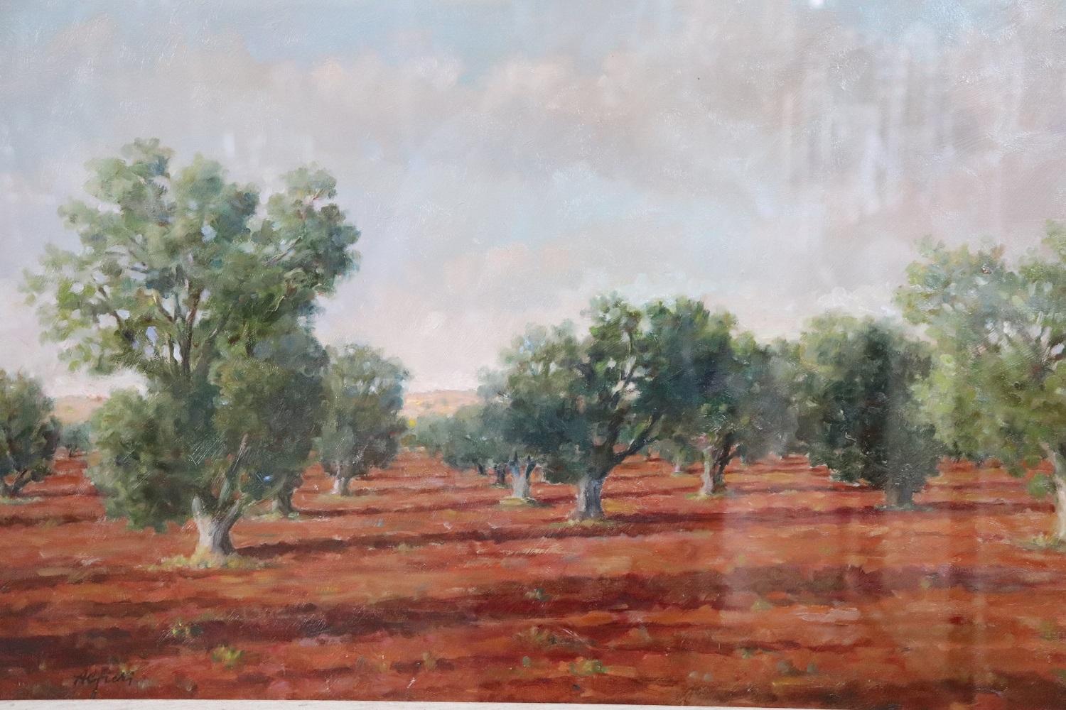 Belle peinture à l'huile sur toile des années 1970. Un splendide paysage italien avec des oliviers, précisément dans la ville de Tarquinia, dans le sud de l'Italie. Signé par l'artiste Alfieri Manlio (Tarquinia, 23 mag. 1909 - Gaeta 1991).