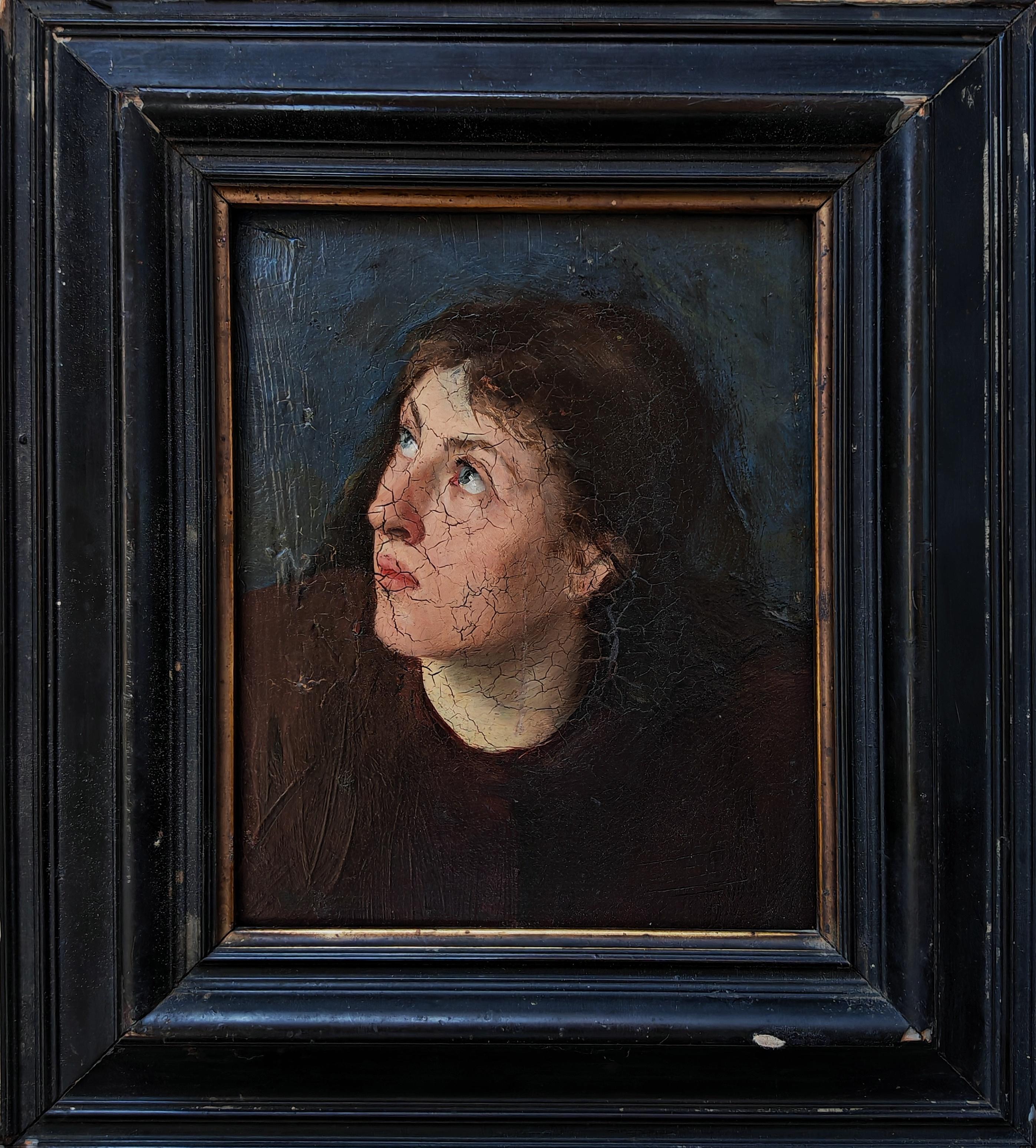 In diesem Angebot finden Sie ein auffälliges Ölgemälde auf Karton. Es zeigt das Porträt einer Frau, deren Gesicht nach links gewandt ist und deren Blick nach oben gerichtet ist, als erwarte sie eine Antwort von oben. Auf der Rückseite des Gemäldes