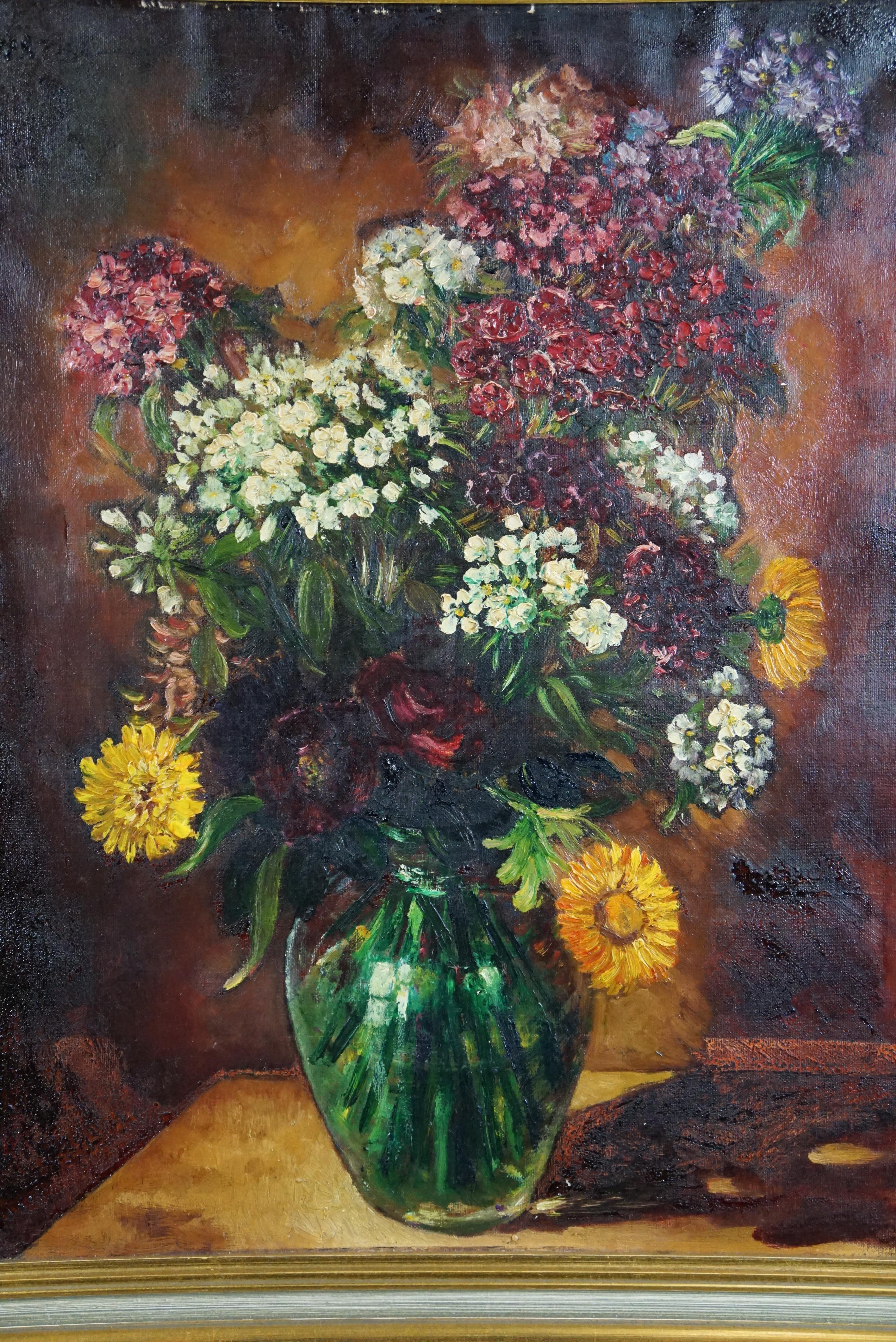 Offered is this floral beauty captured in oil paint in warm colors. Transform your space into an oasis of natural beauty and sophistication with this breathtaking oil painting of a glass vase with flowers. This artwork will not only brighten up your