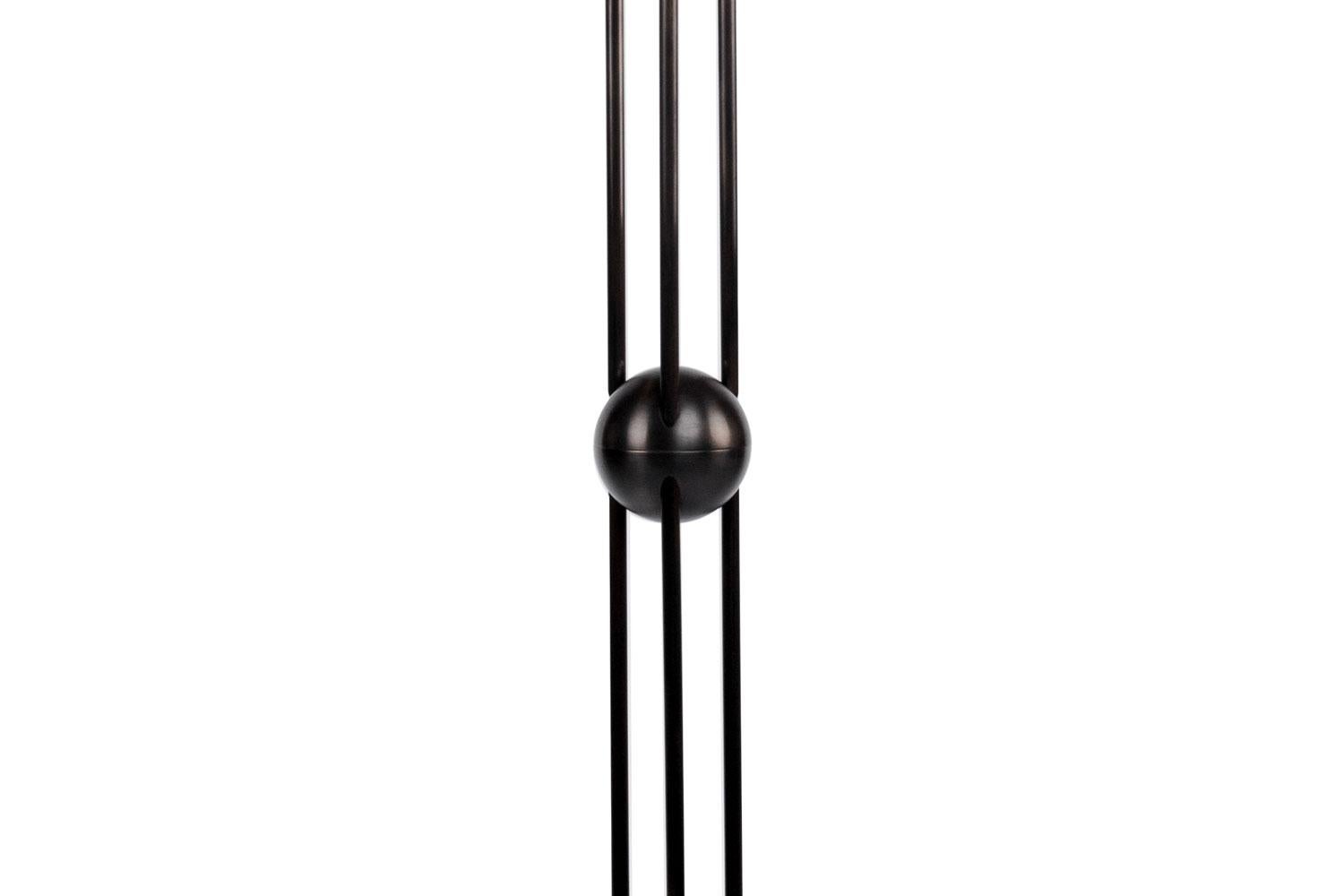 Lantern Floor Lamp By Apparatus

The slip-cast porcelain forms of the lantern series float along a rigid oil rubbed bronze brass structure. Their glow is punctuated by finely incised fluting, connecting the most essential element of historical