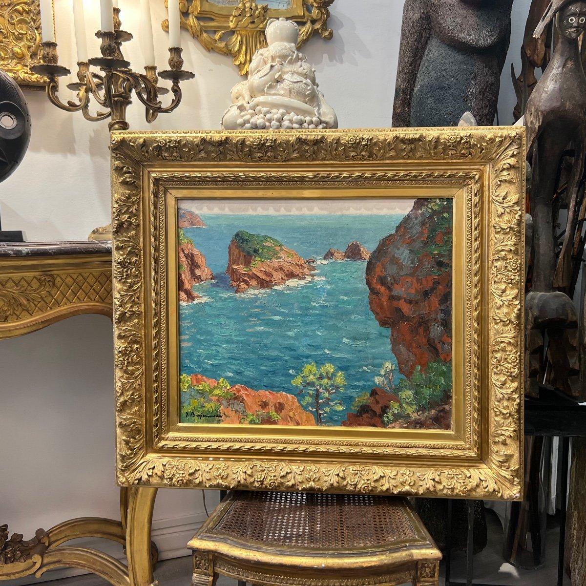 'Corniche de l'Esterel' by Jehan Berjonneau (1890-1966), this artwork captures the stunning beauty of the Corniche de l'Esterel, also known as the Corniche d’Or, a marvellous road nestled between the Esterel mountains and the beautiful turquoise sea