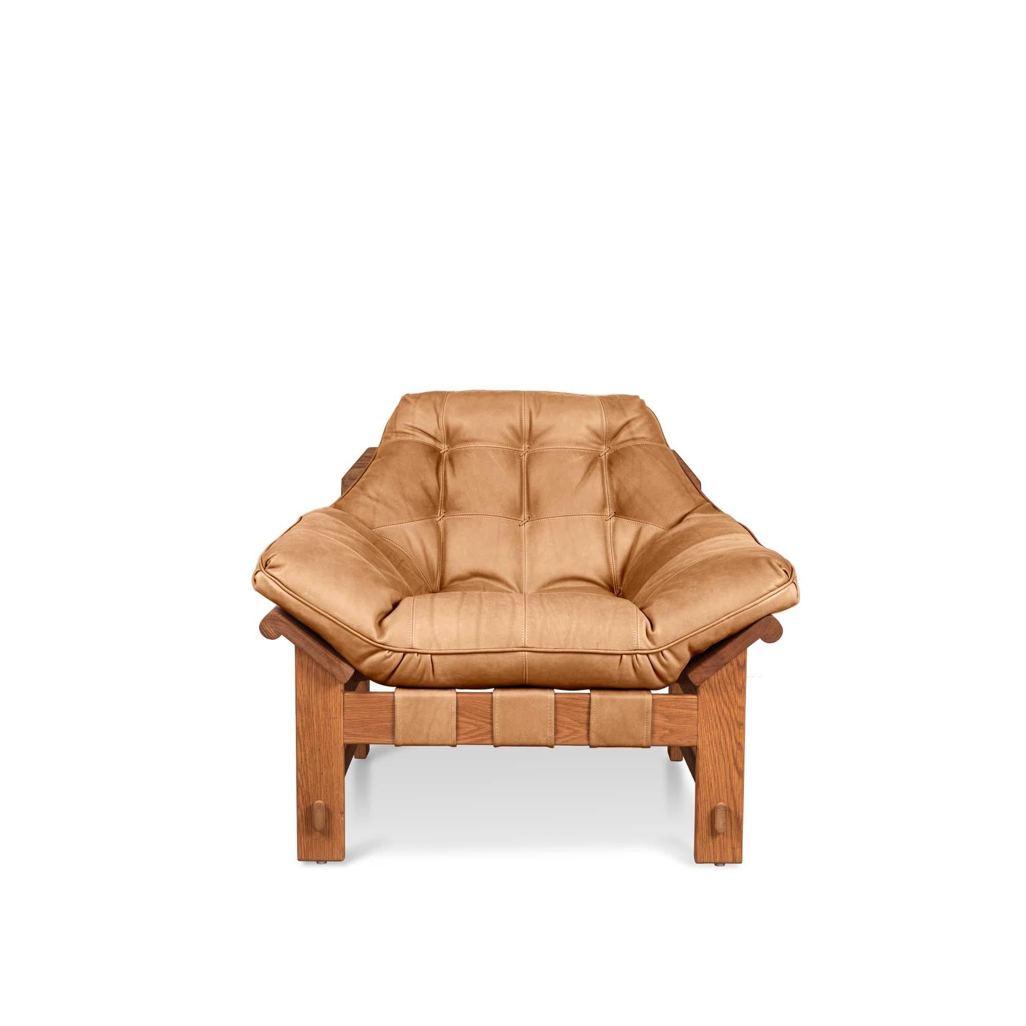 The Ojai lounge chair features a solid white oak or solid walnut base and a single tufted leather cushion with leather straps. Shown here in deer tan leather and oiled oak.

The Lawson-Fenning collection is designed and handmade in Los Angeles,