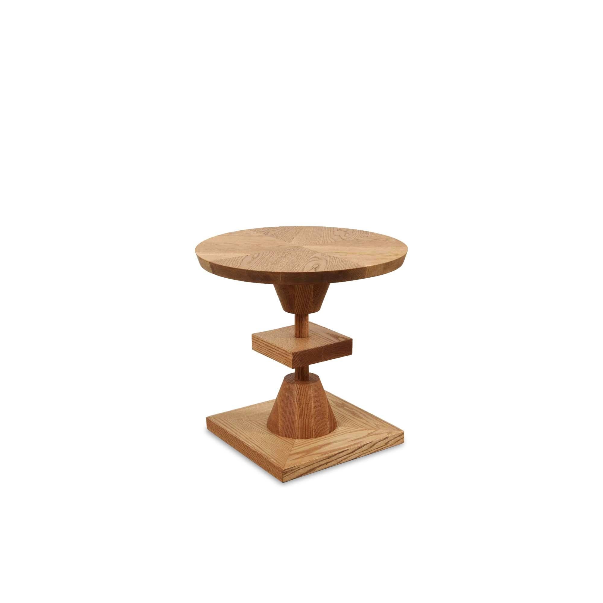 Oiled oak morro table by Lawson-Fenning. The Morro table features a series of geometric shapes stacked on top of each other with solid wood details. Available in American walnut or white oak. 

The Lawson-Fenning Collection is designed and