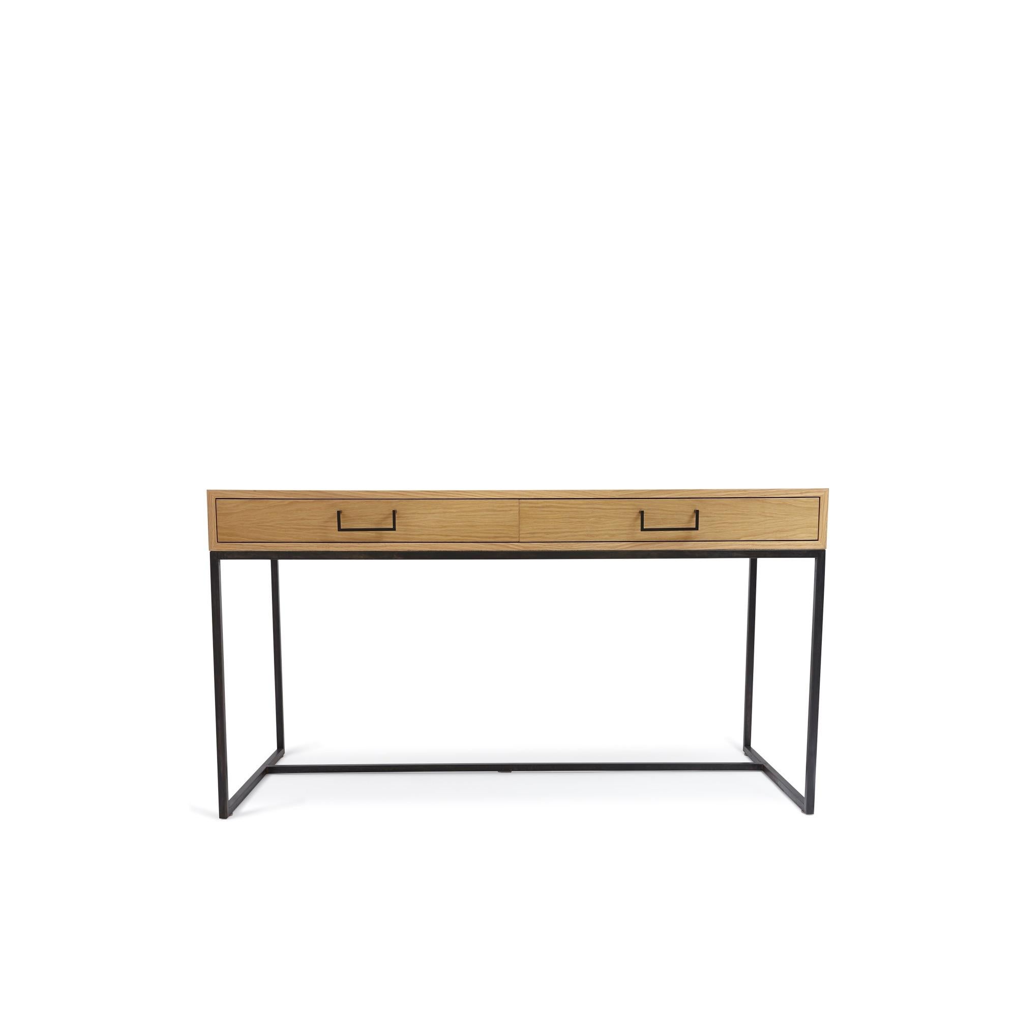 The thin frame desk has two drawers, each with its own pencil tray and features a plated steel base and handles. Available in American walnut or white oak. 

The Lawson-Fenning Collection is designed and handmade in Los Angeles, California. Reach