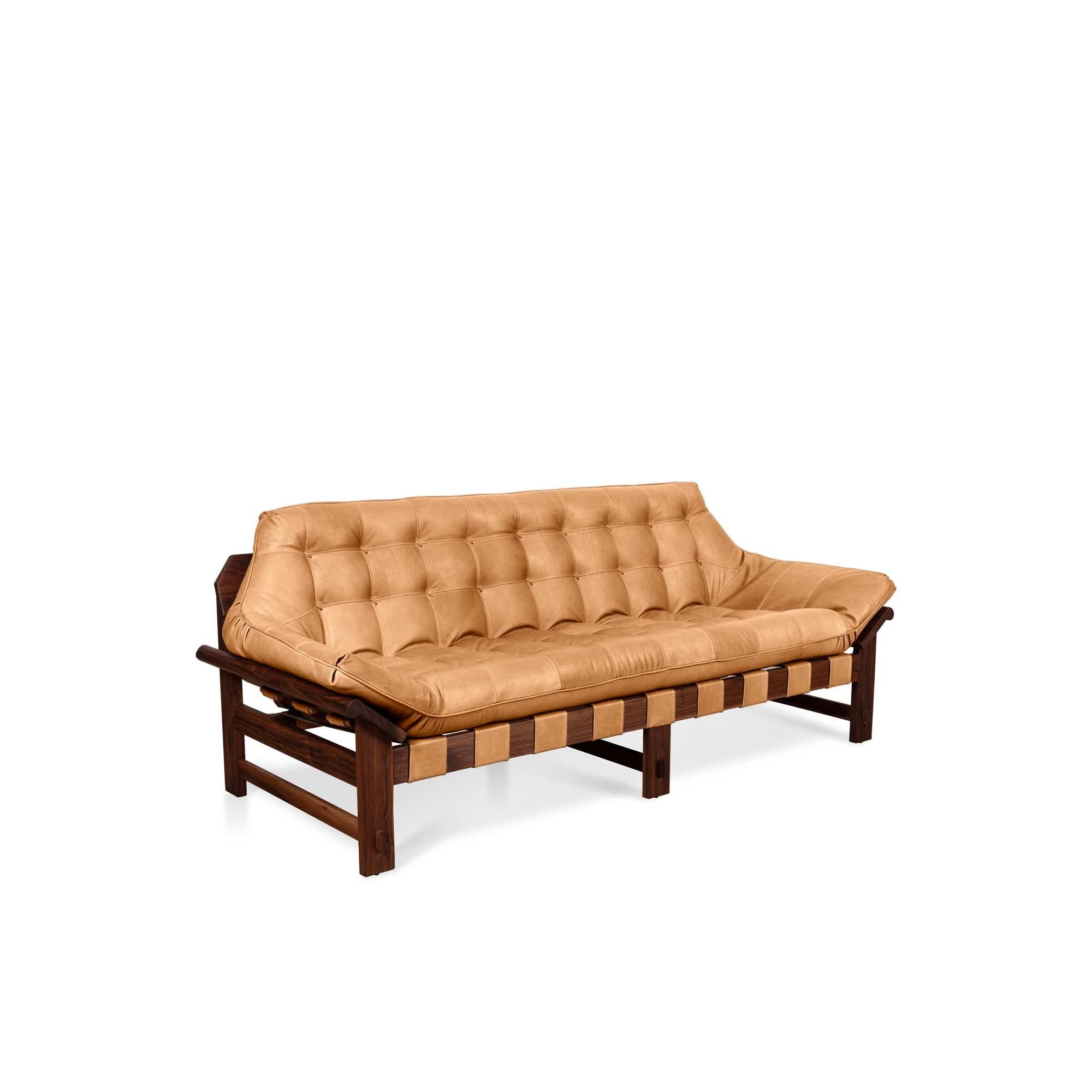 The Ojai sofa features a solid white oak or solid walnut base and a single tufted leather cushion with leather straps. Shown here in deer tan leather and oiled walnut. 

The Lawson-Fenning Collection is designed and handmade in Los Angeles,