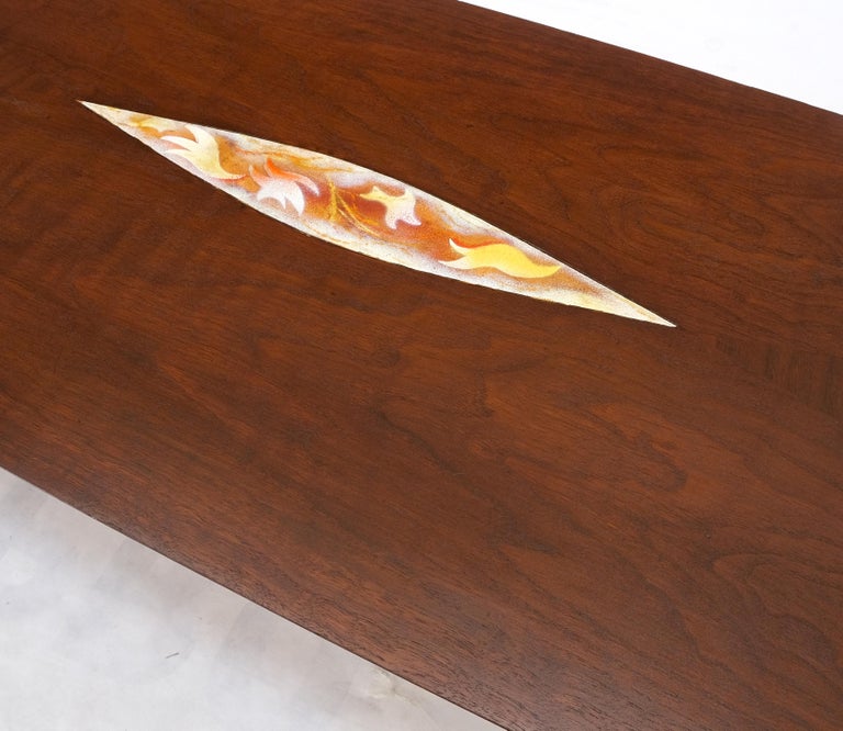 Oiled walnut tile insert floating top mid-century long surfboard coffee table.