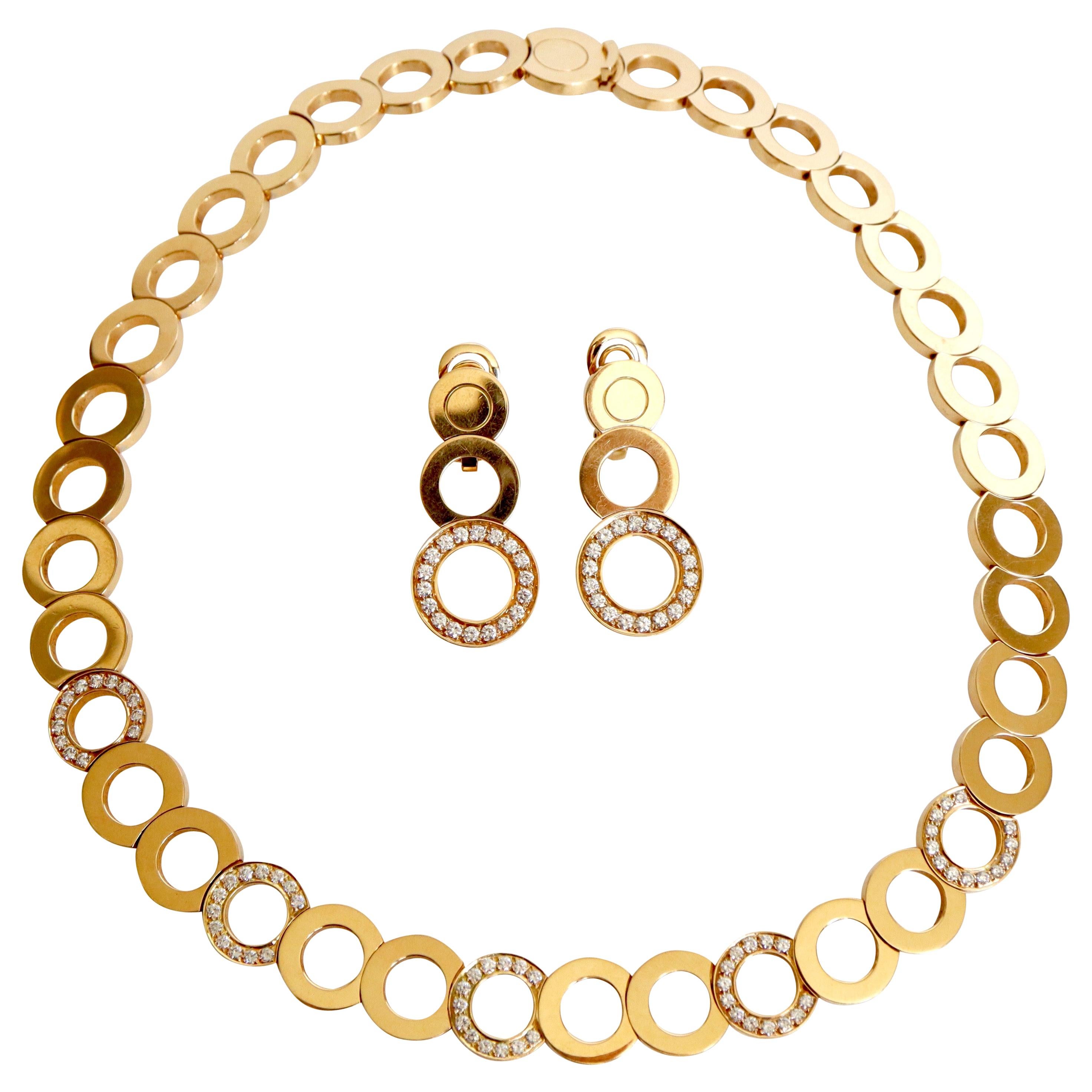 Das Werk von J.J. Set aus einer Halskette und Ohrringen aus 18 Karat Gold und Diamanten von Perrin