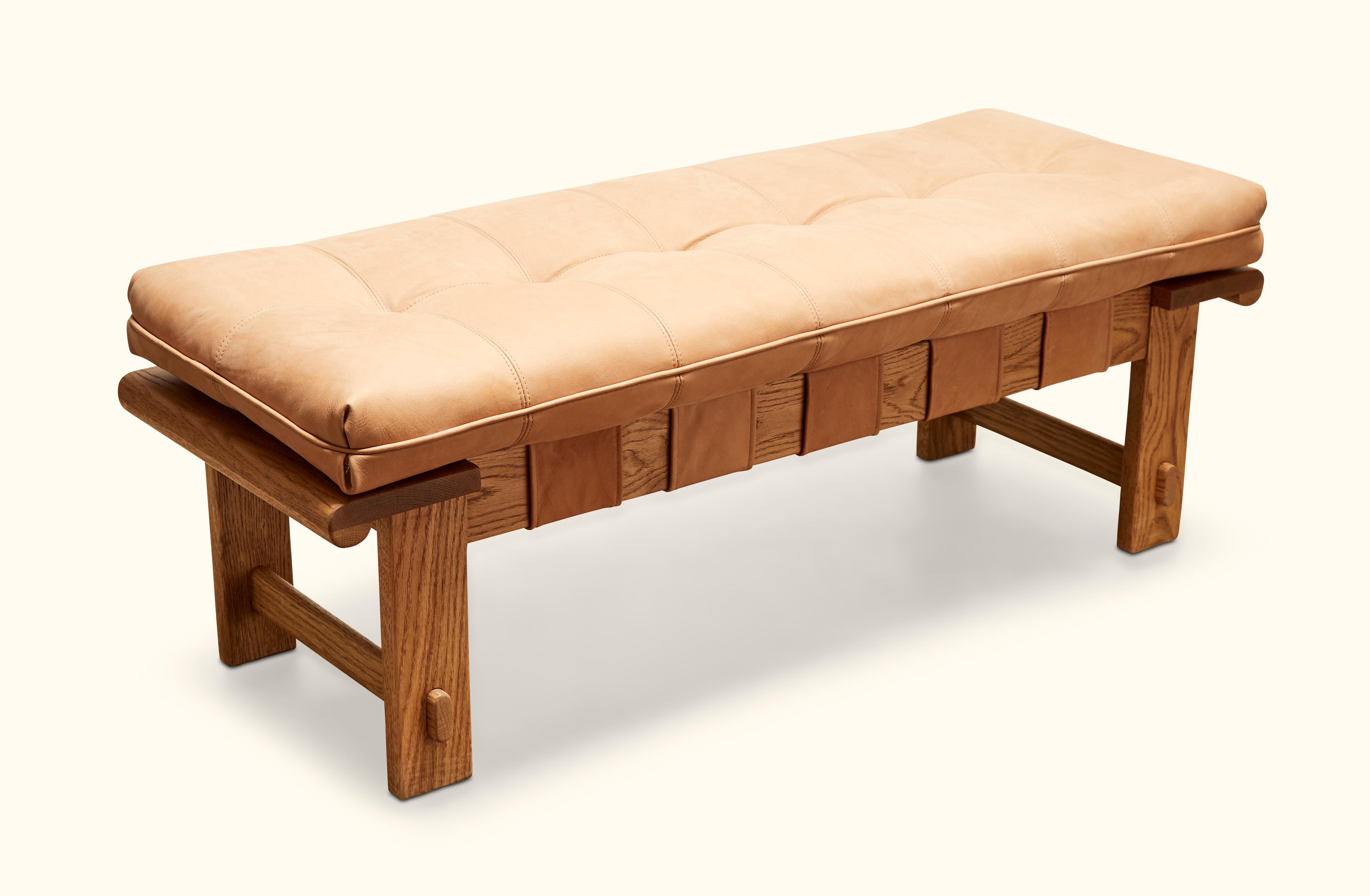 The Ojai Bench features a solid white oak or solid walnut base and a tufted leather cushion with leather straps. Available in two sizes. Shown here in Tan Leather and Oiled Oak.

The Lawson-Fenning Collection is designed and handmade in Los Angeles,