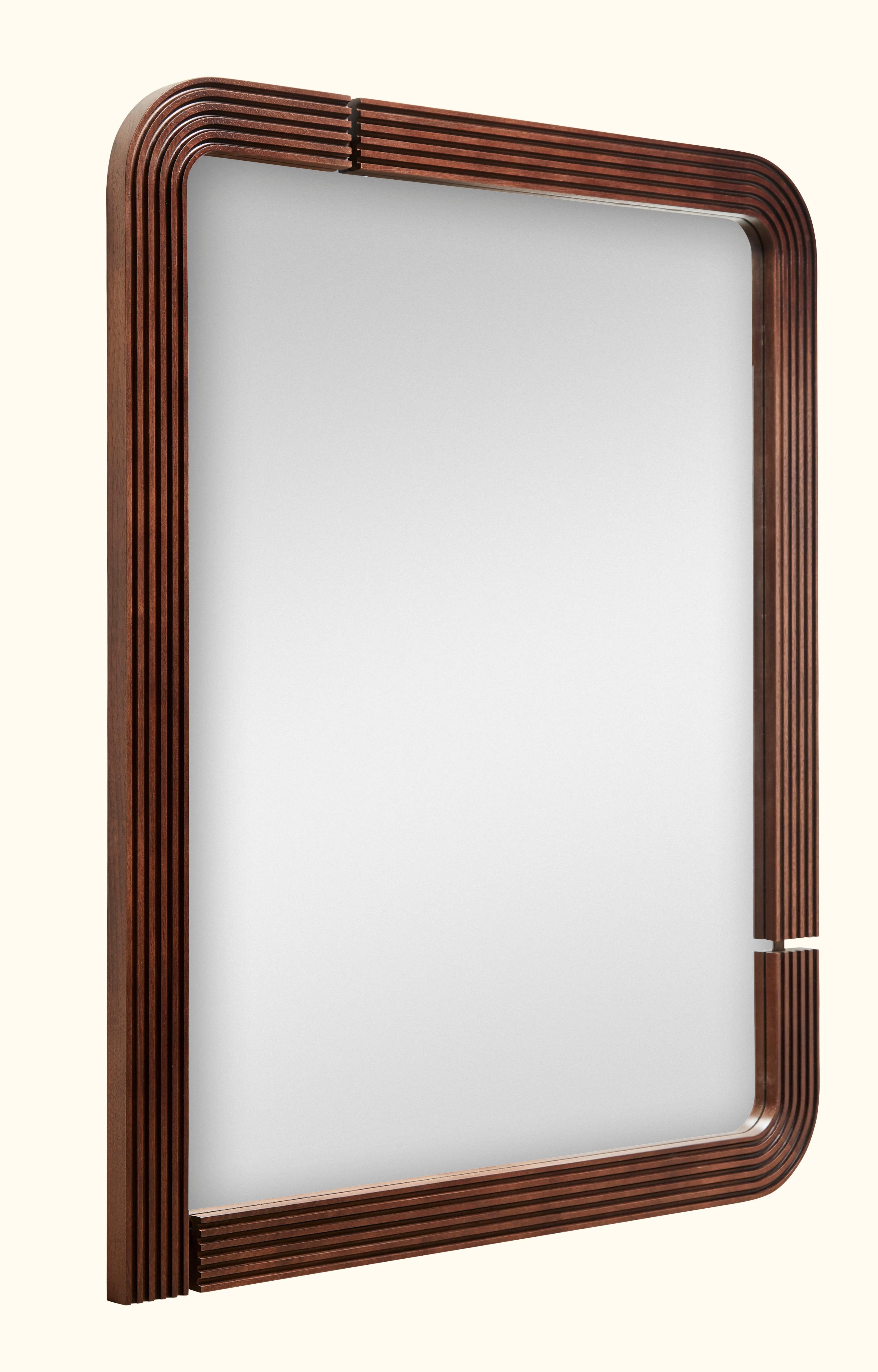 The Ojai mirror features a solid American walnut or white oak frame that is laser cut with a groove detail.

The Lawson-Fenning Collection is designed and handmade in Los Angeles, California. 

Contact us to find out what finishes are currently in