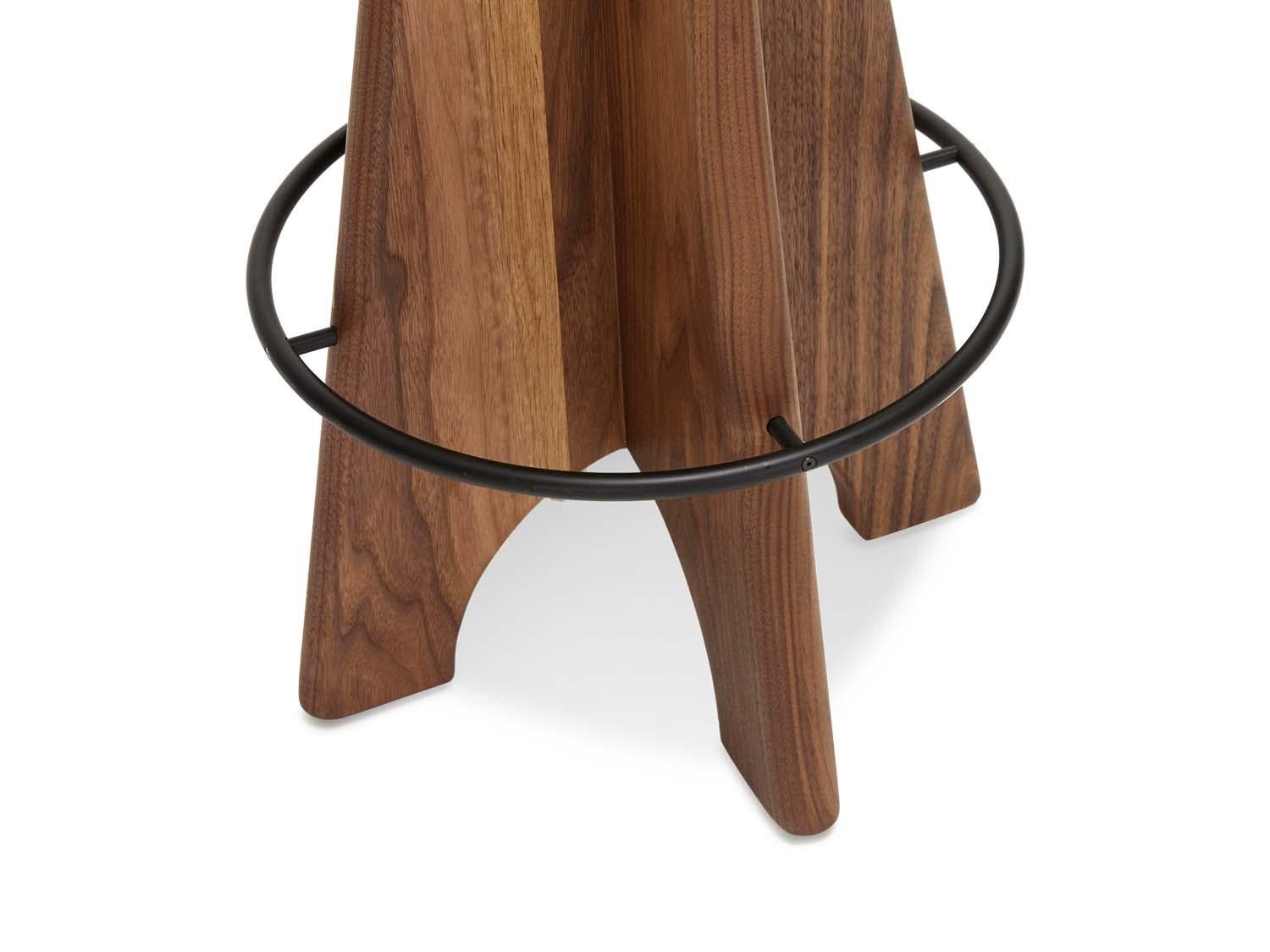 The Ojai barstool features a sculptural wood base, powdercoated metal footrest and an upholstered swivel seat.

 

